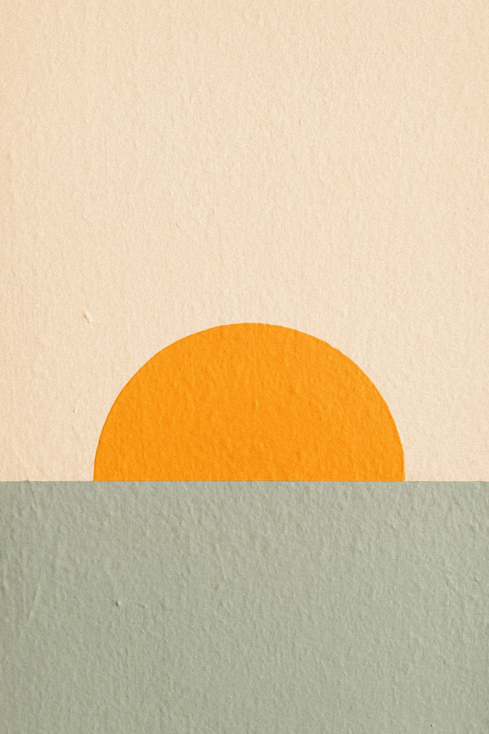 image of what looks like a sun rise, beige, orange, and green colors