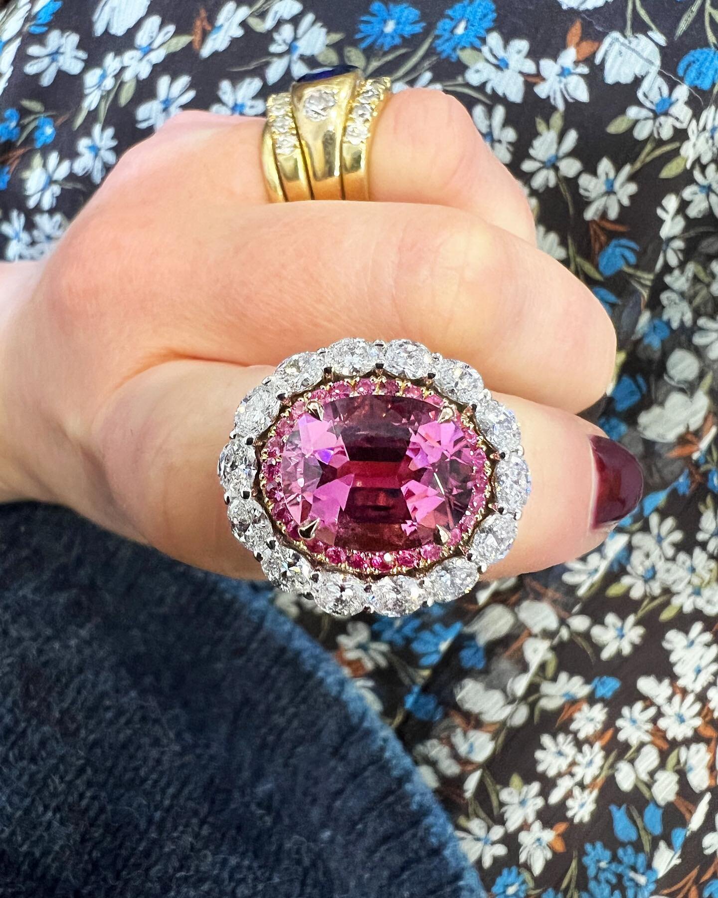 For Shannon 〰️ an 18k rose gold and platinum halo cocktail ring. Set with a central pink Mozambique oval cut Tourmaline, a halo of round pink sapphires and 15 oval cut diamonds. A true showstopper, in every sense of the word ✨

#emmaclarksonwebb #jew