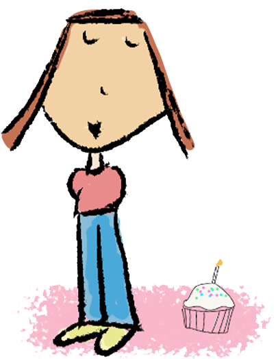 Penelope standing next to a birthday cupcake