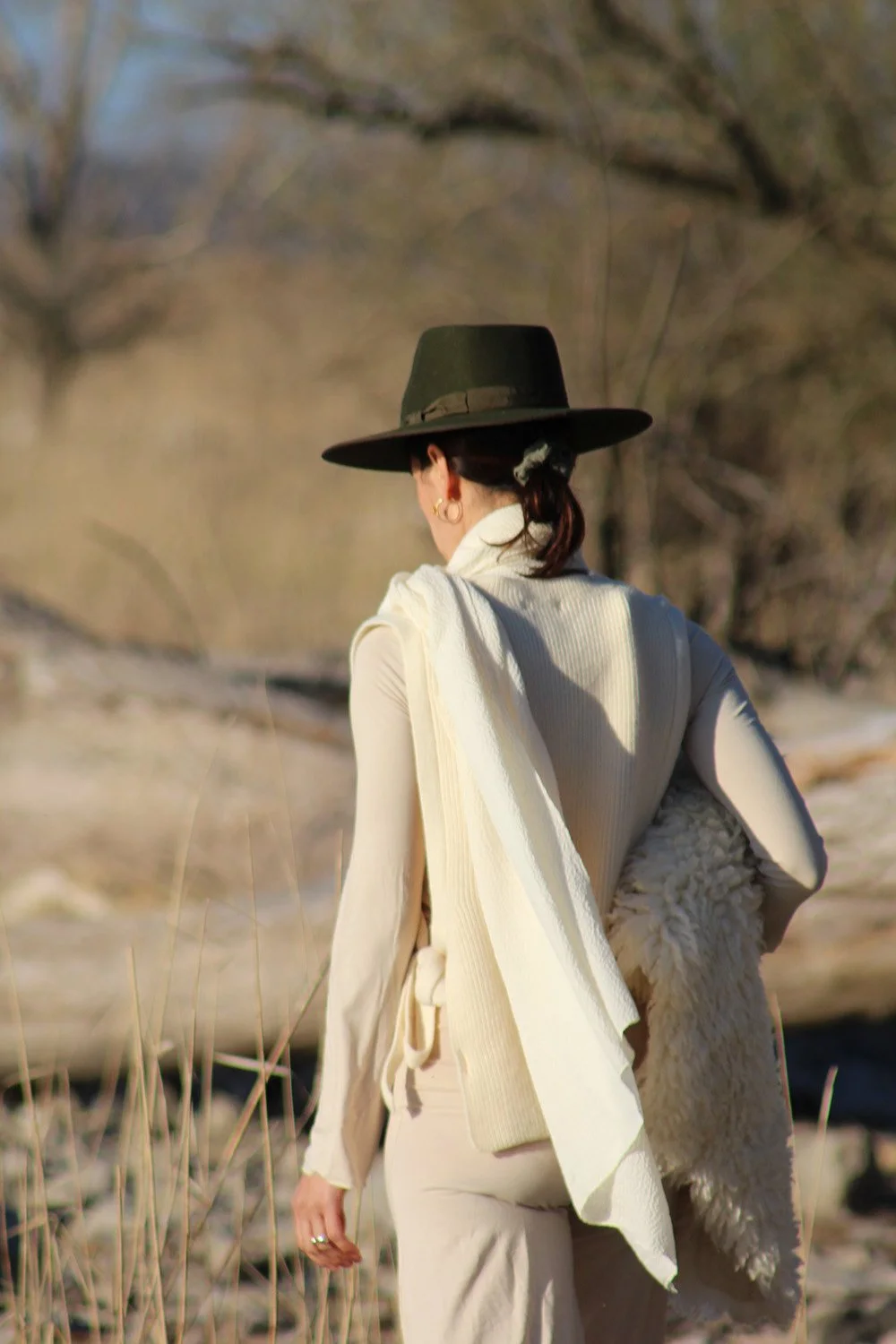 Jil Bianca walking in nature, representing her breathwork practice for mind body connection.
