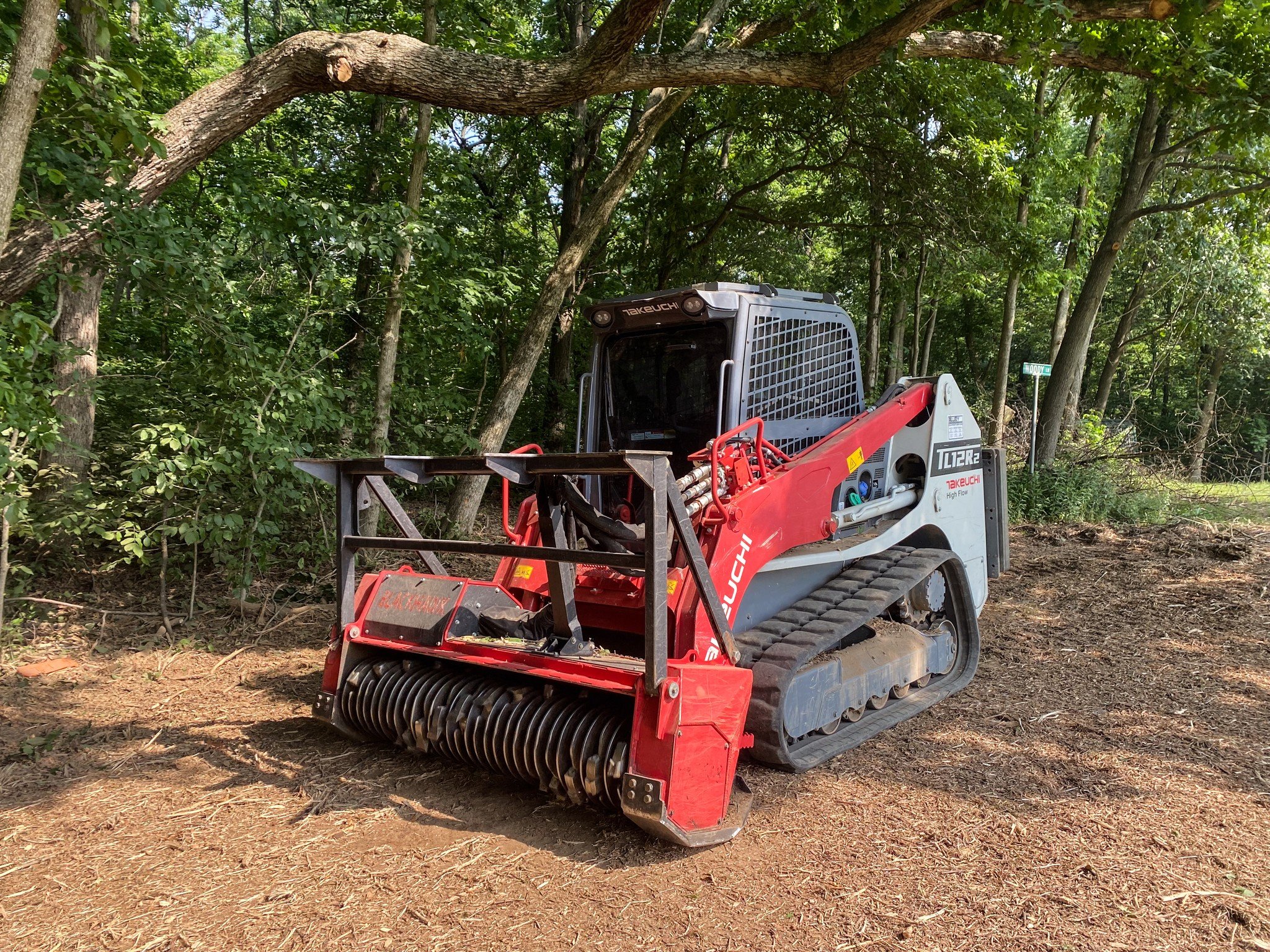 A photo of taylor tree services brand new forestry mulcher.