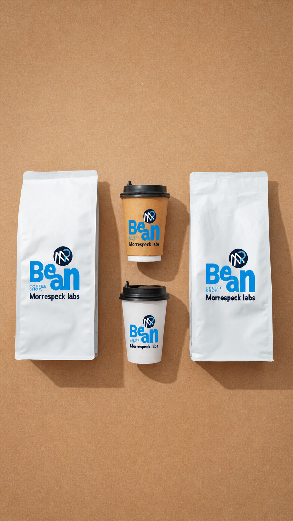 Coffee product branding and packaging design created by Morrespeck Labs featuring branded coffee bags and takeaway cups for a consumer product brand