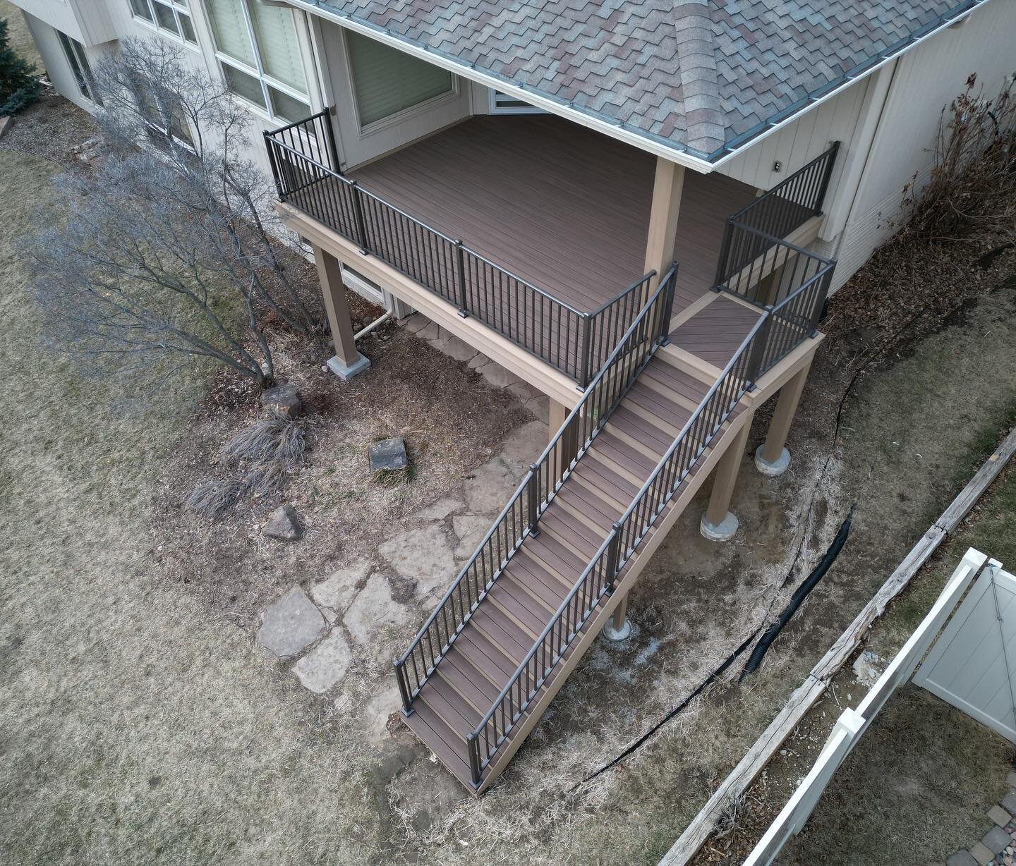 Nice day to show off a project!  Patio is next for this project. #Timbertech/Azek deck with #westburyrailings. English Walnut w/ Weathered Teak picture frame and bronze rails. #omaha #deck #deckbuilders #custom @timbertech @azekbuildingproducts @kyle