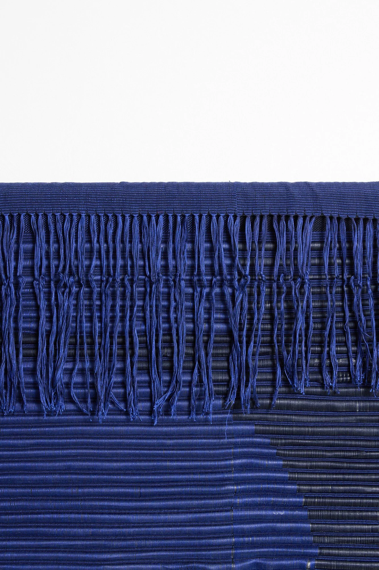 royal and dark blue woven rubber fringe