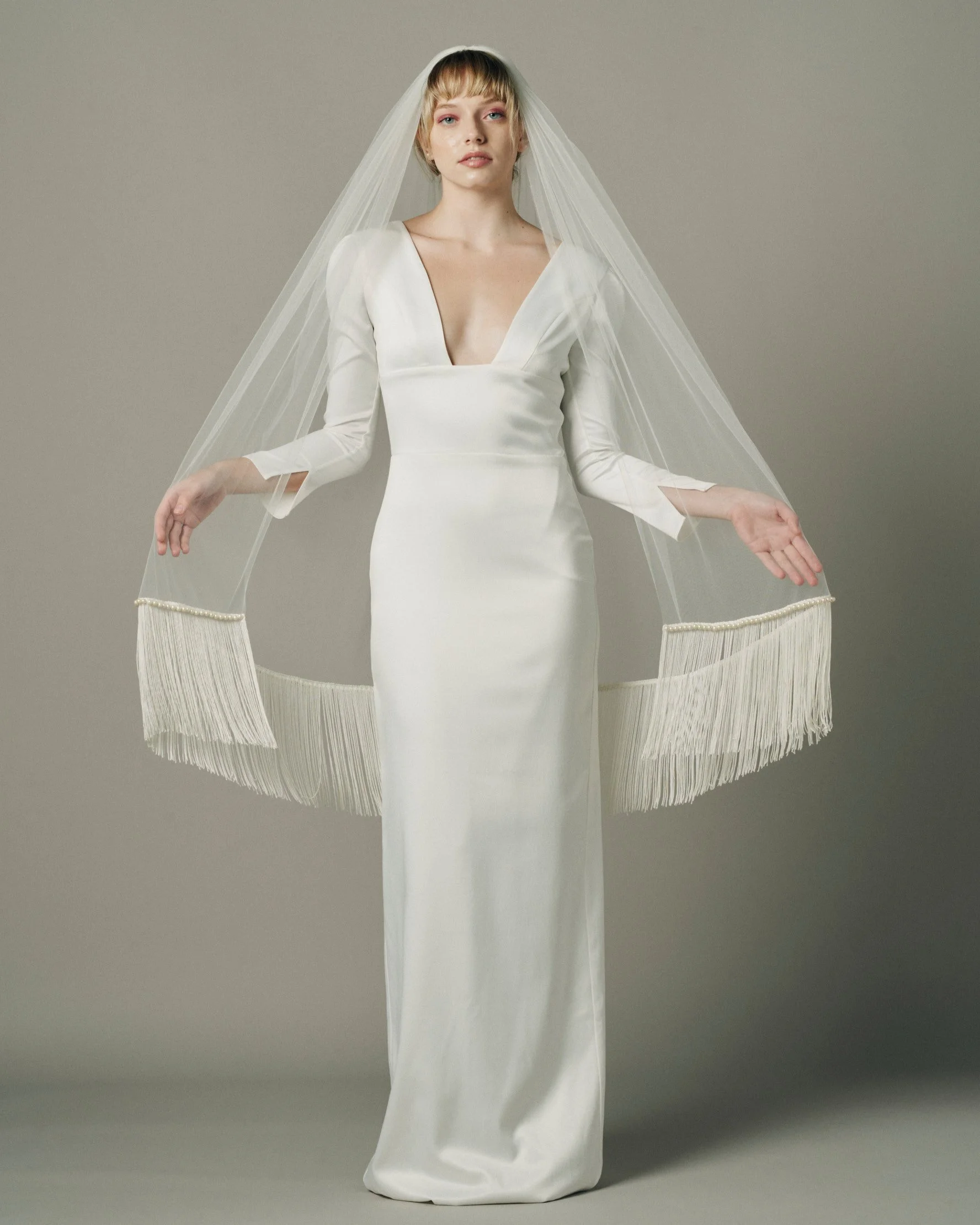 Ofrenda Fringe Wedding Veil, fingertip length with pearl embellishments