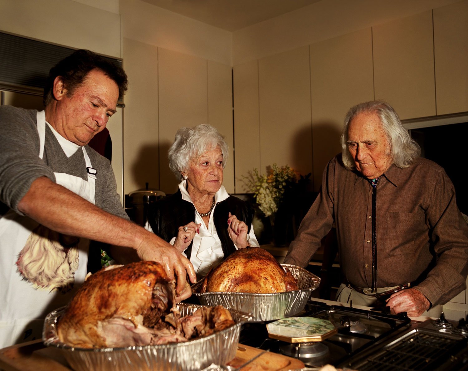 Dad carving the turkey, 2004