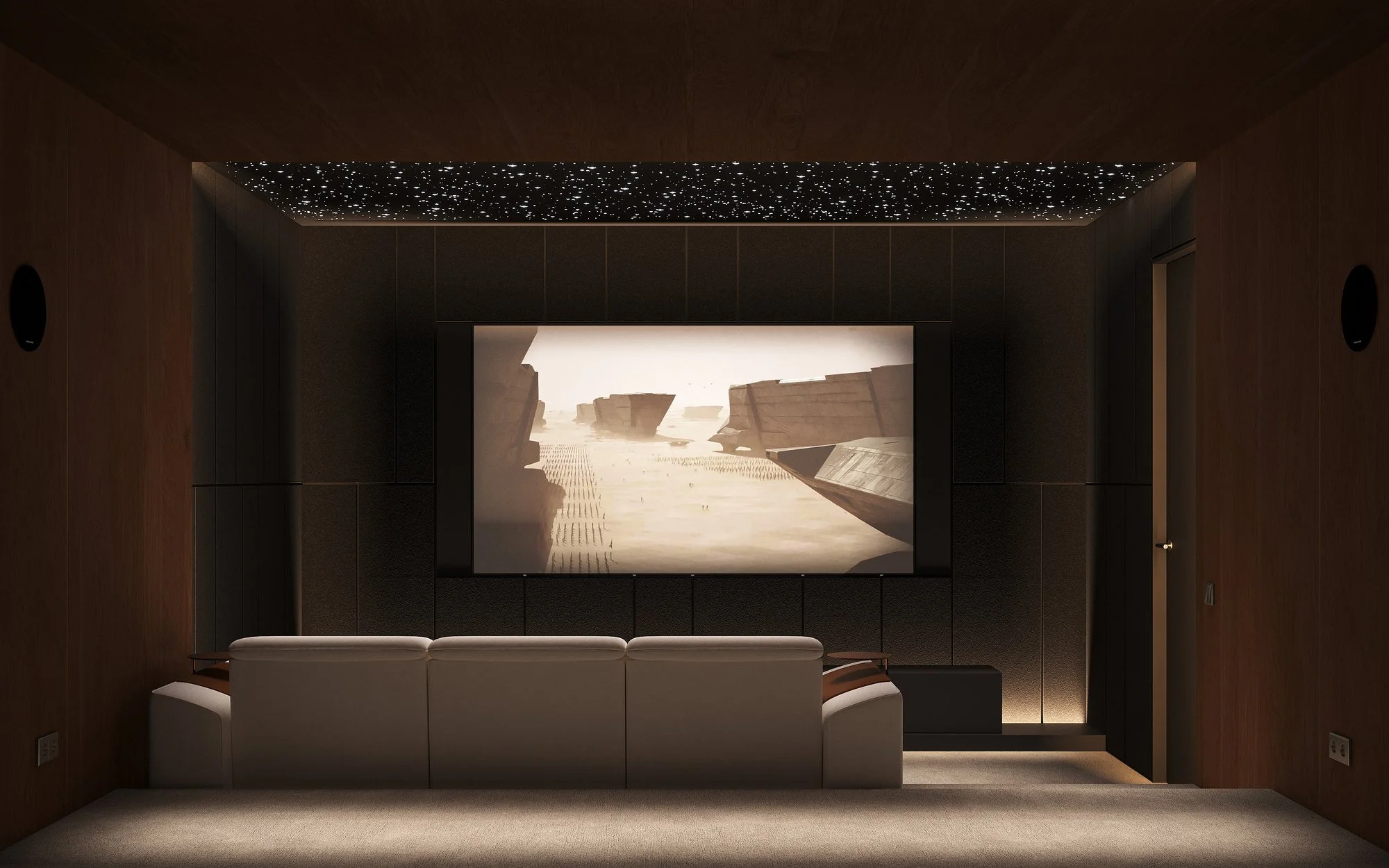 Sala de cine con sofá, pantalla y techo oscuro.