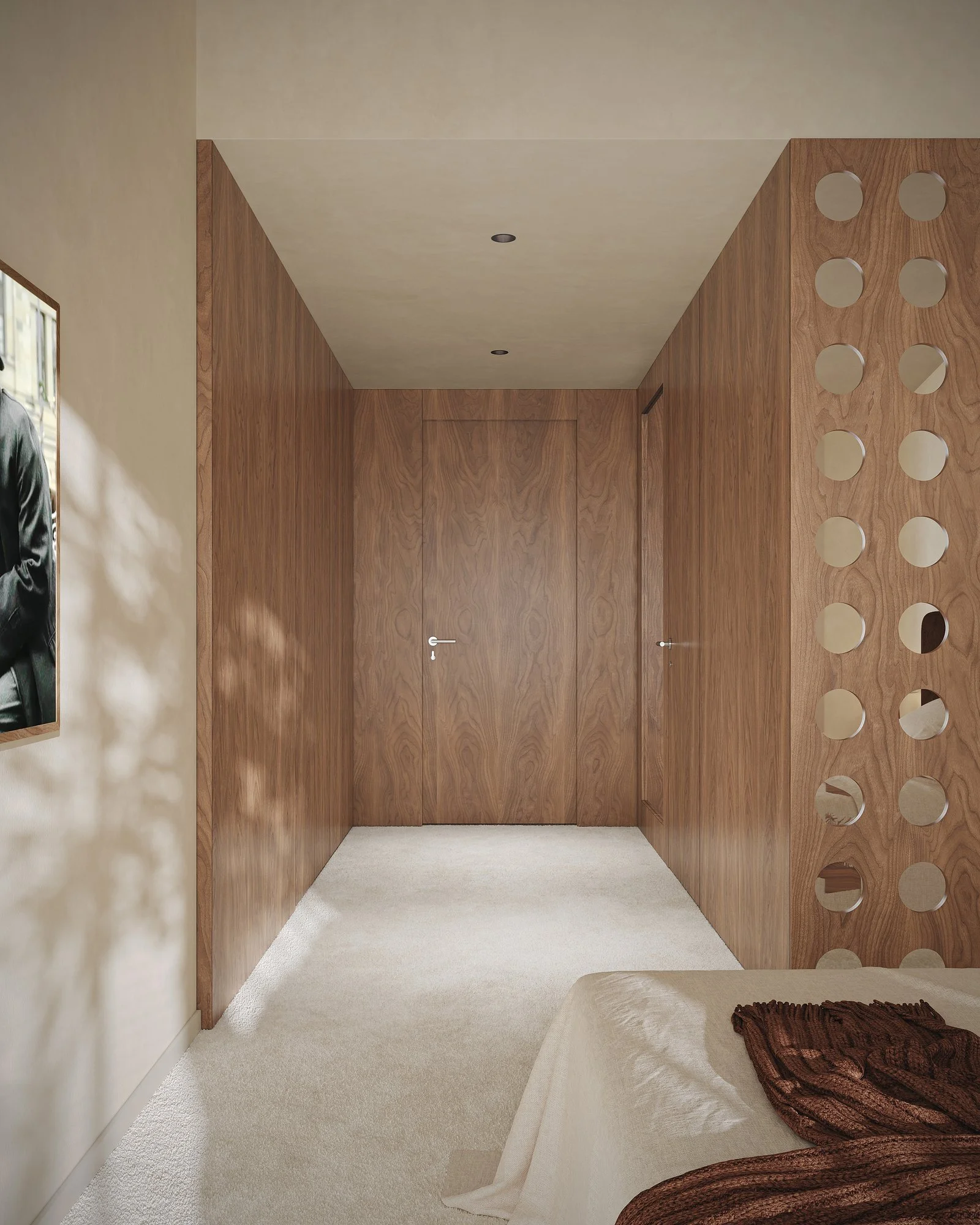 Armarios de madera y panel con perforaciones circulares junto a un dormitorio.