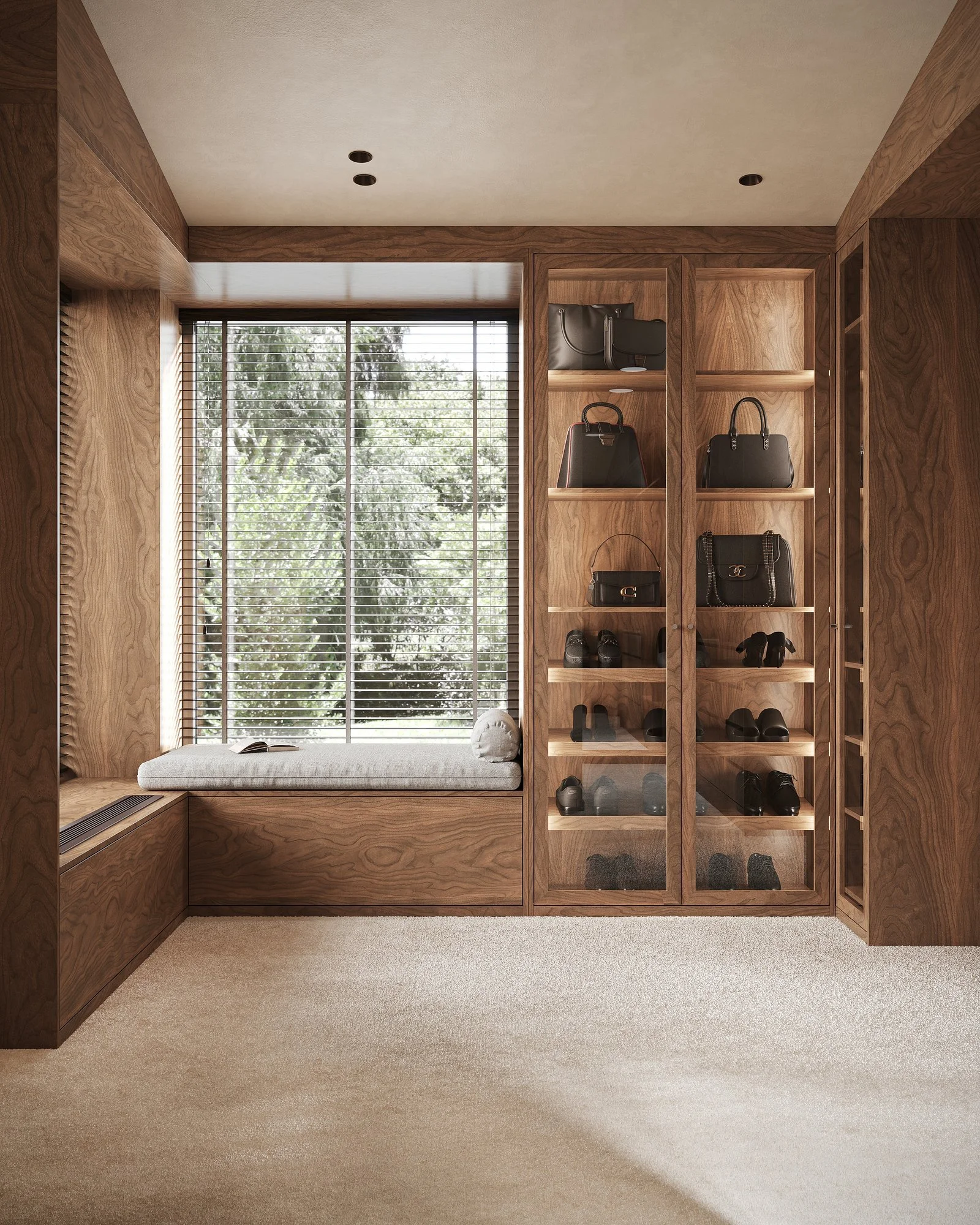 Vestidor con armarios de madera y banco bajo la ventana.