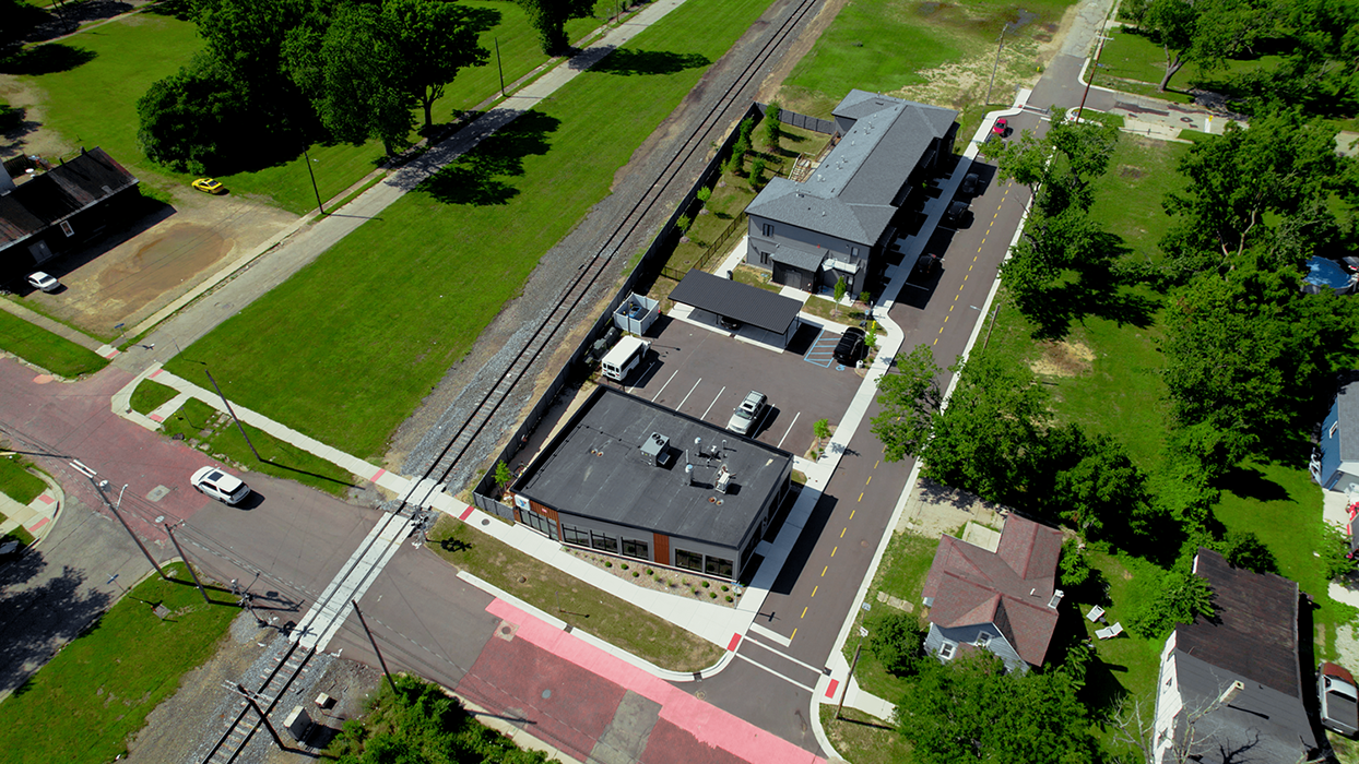 Aerial of Zone 32 after Phase 1 completion; commercial building at 313 E Frank and residential at 815 N Pitcher St.