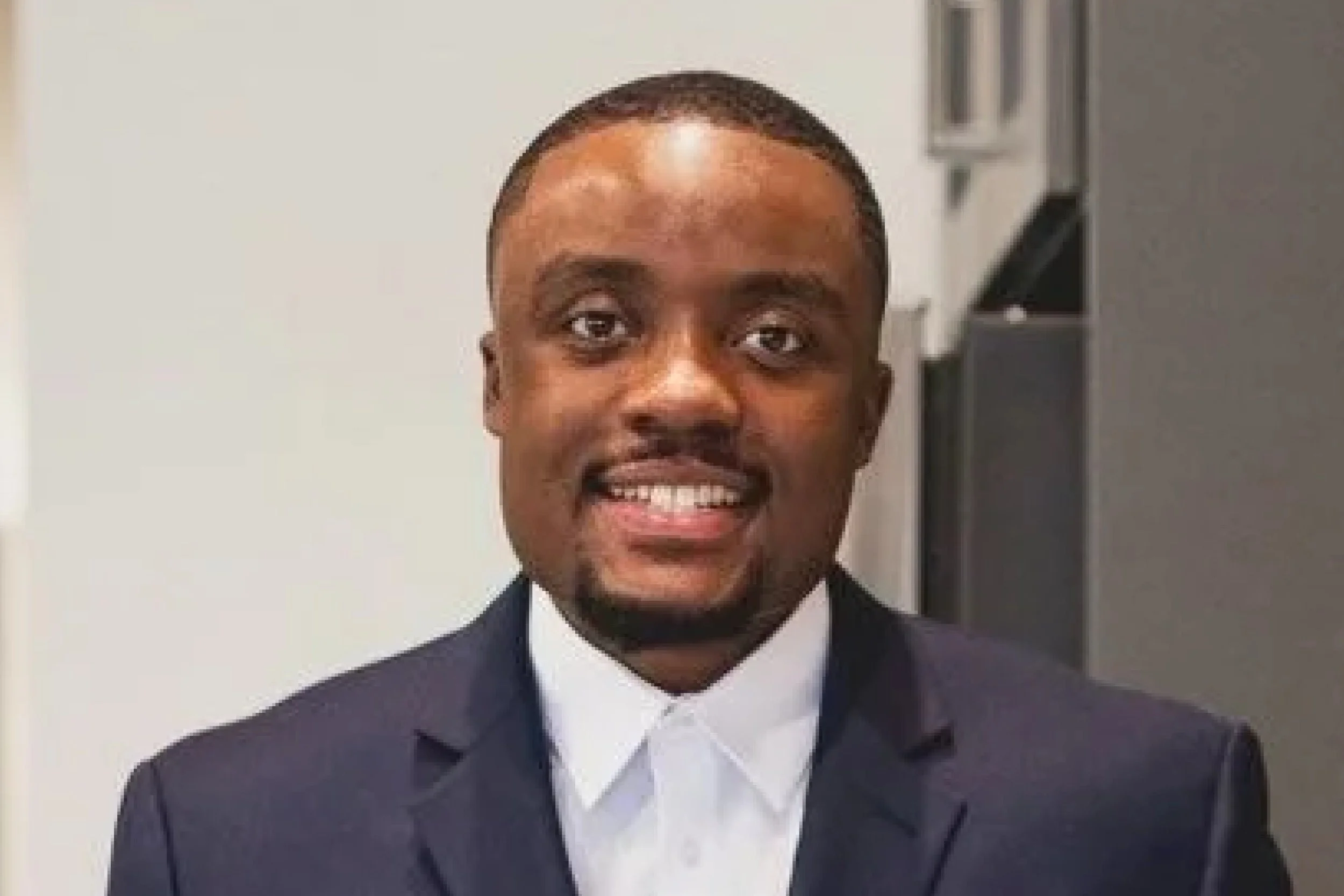 Portrait of Jamauri Bogan, Founder and Chief Executive Officer of Bogan Developments, a visionary leader dedicated to transforming communities through equitable, people-centered development.