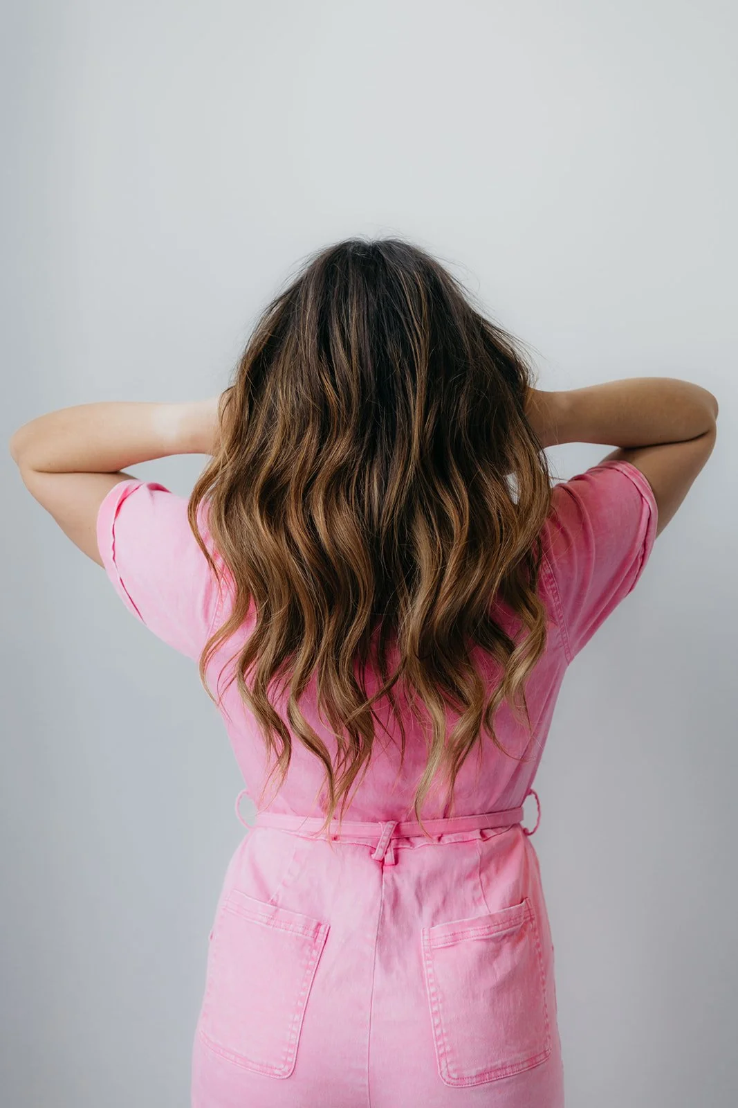 Huss Does Hair showing real-life hair color example