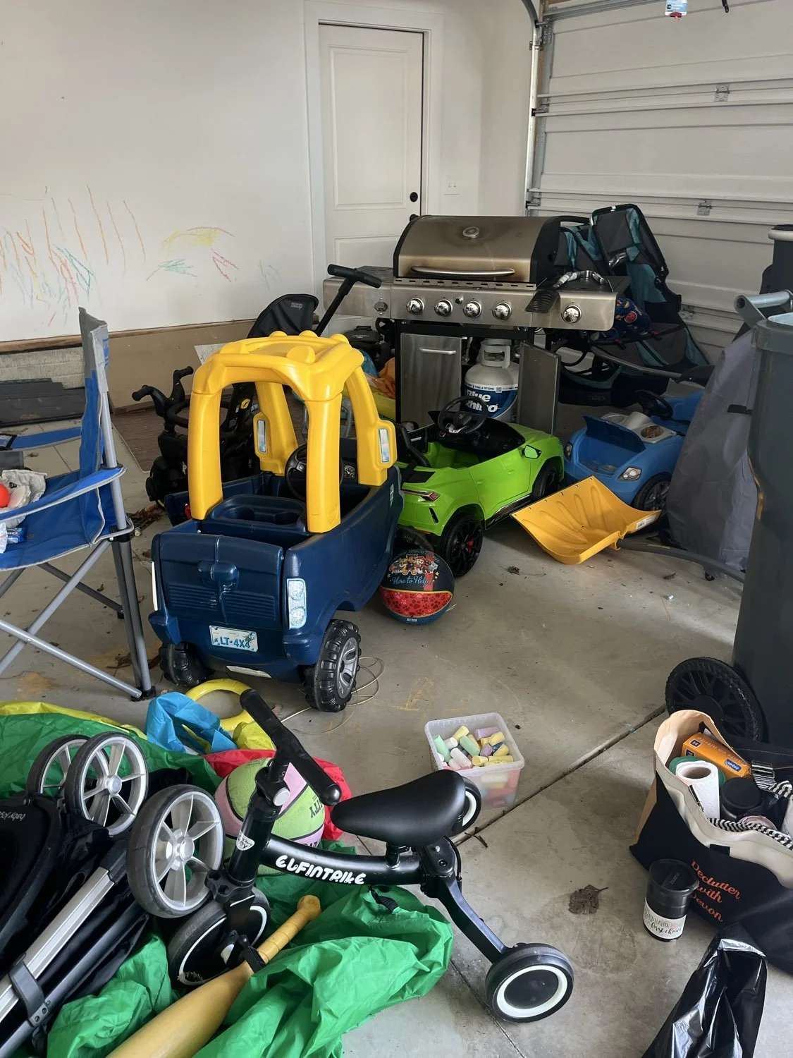 Overfilled and messy garage before organizing in Broadview Heights, Ohio