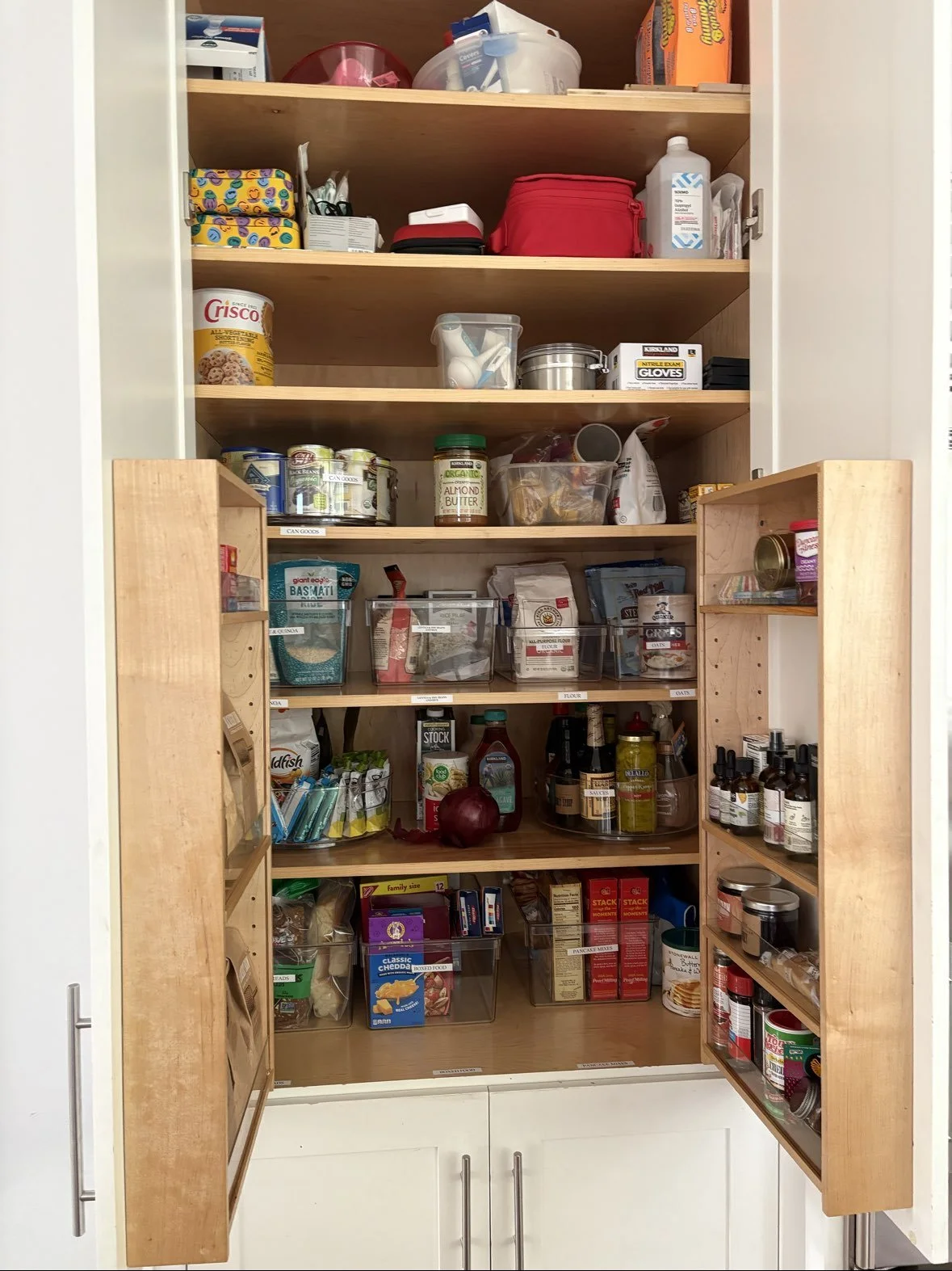 tidy and neat pantry in Bratenahl, Ohio after organizing by Declutter with Devon