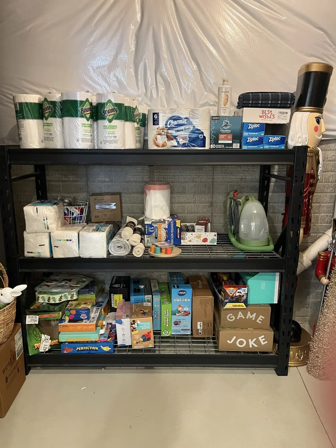 Organized basement storage room with shelves and bins after decluttering in Broadview Heights, Ohio