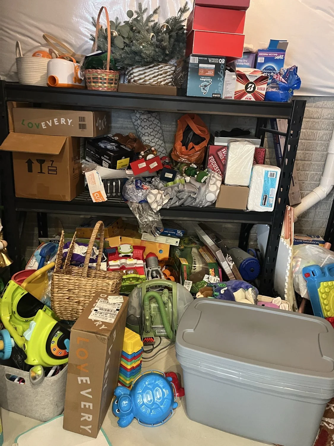 Cluttered basement storage room before professional organizing in Broadview Heights, Ohio