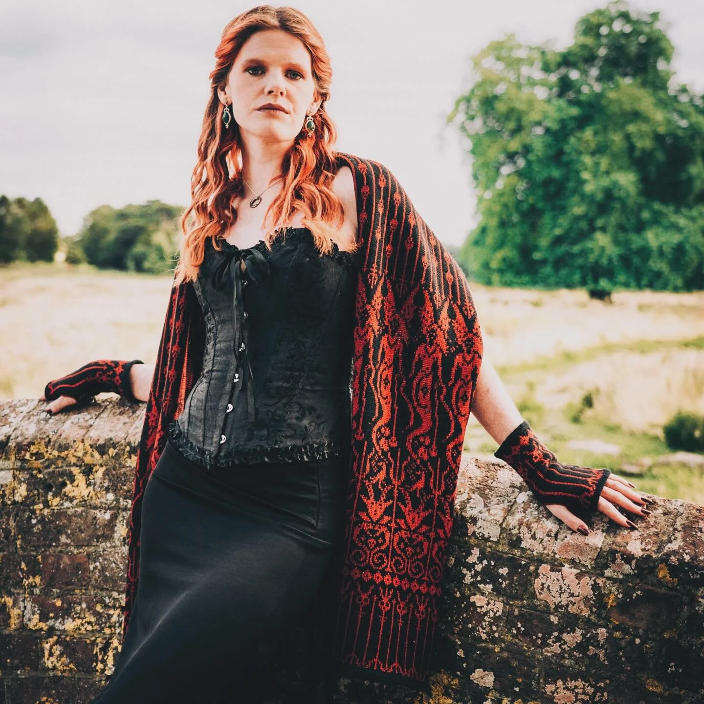 Gorgeous set of the M&eacute;lusine scarf and mittens 🖤
Knitted in black and red by me from start to finish 🧶
You can find them on my OTHERWORLD page on the website!

@thisisryansframe 
@siobhan_blackburn 

#textileart #gothknitting #witchcrafting 