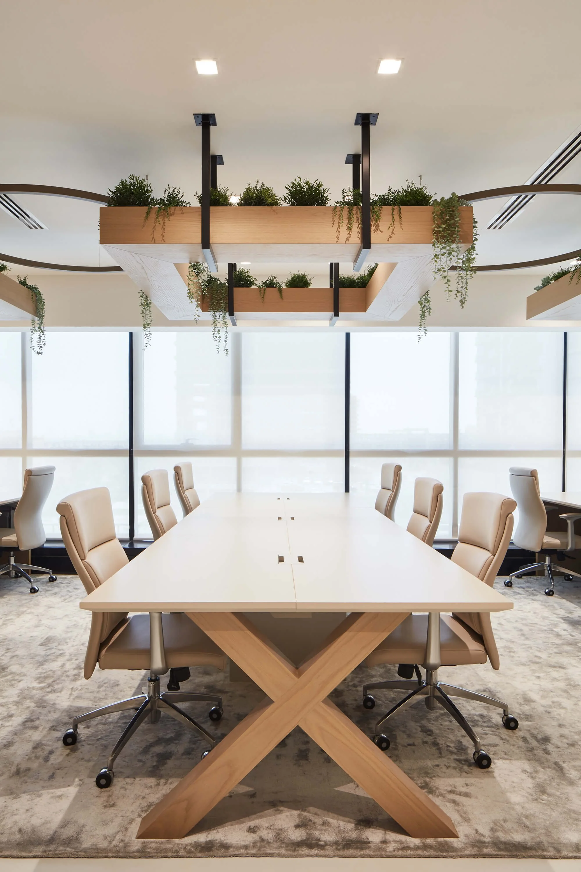 Contemporary office interior designed to create a warm, residential atmosphere with bespoke joinery by MIA Studio.