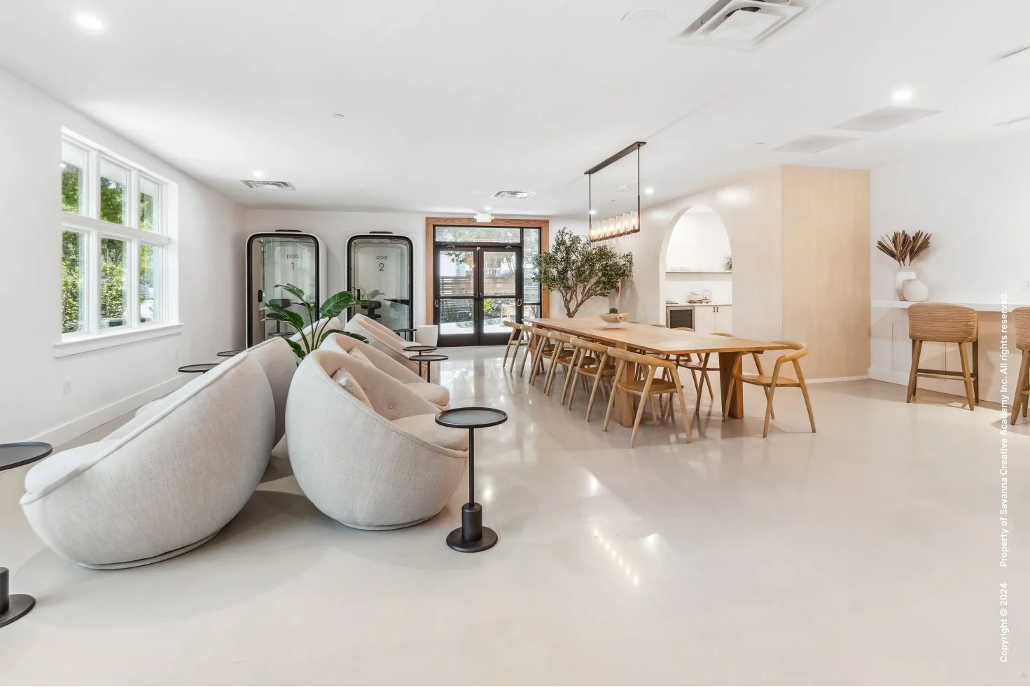 Coworking space at Savanna Nursery School in Frisco, Texas, designed with contemporary interiors and a warm residential feel by MIA Studio.