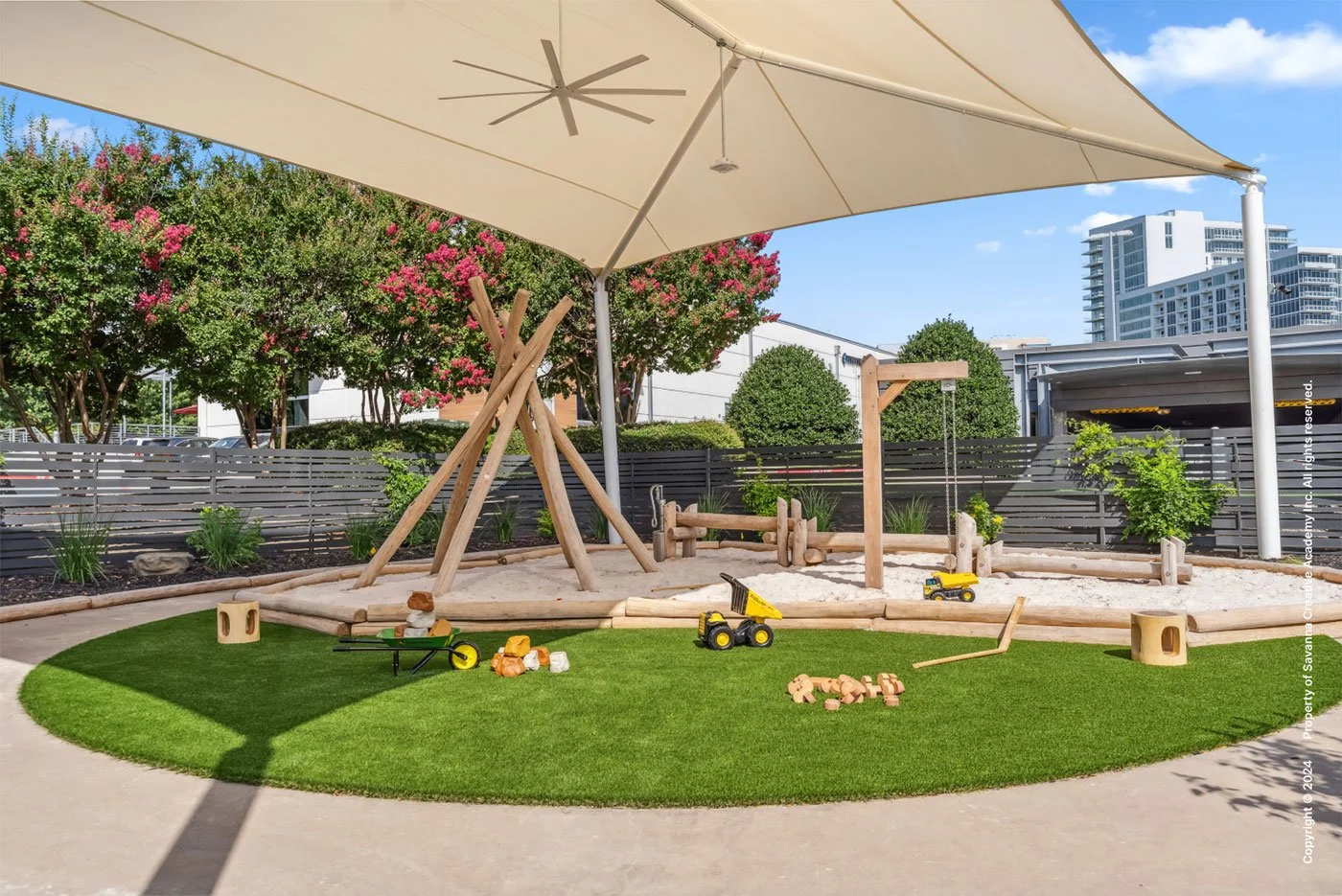 Outdoor play area designed to encourage exploration and connection with nature by MIA Studio.