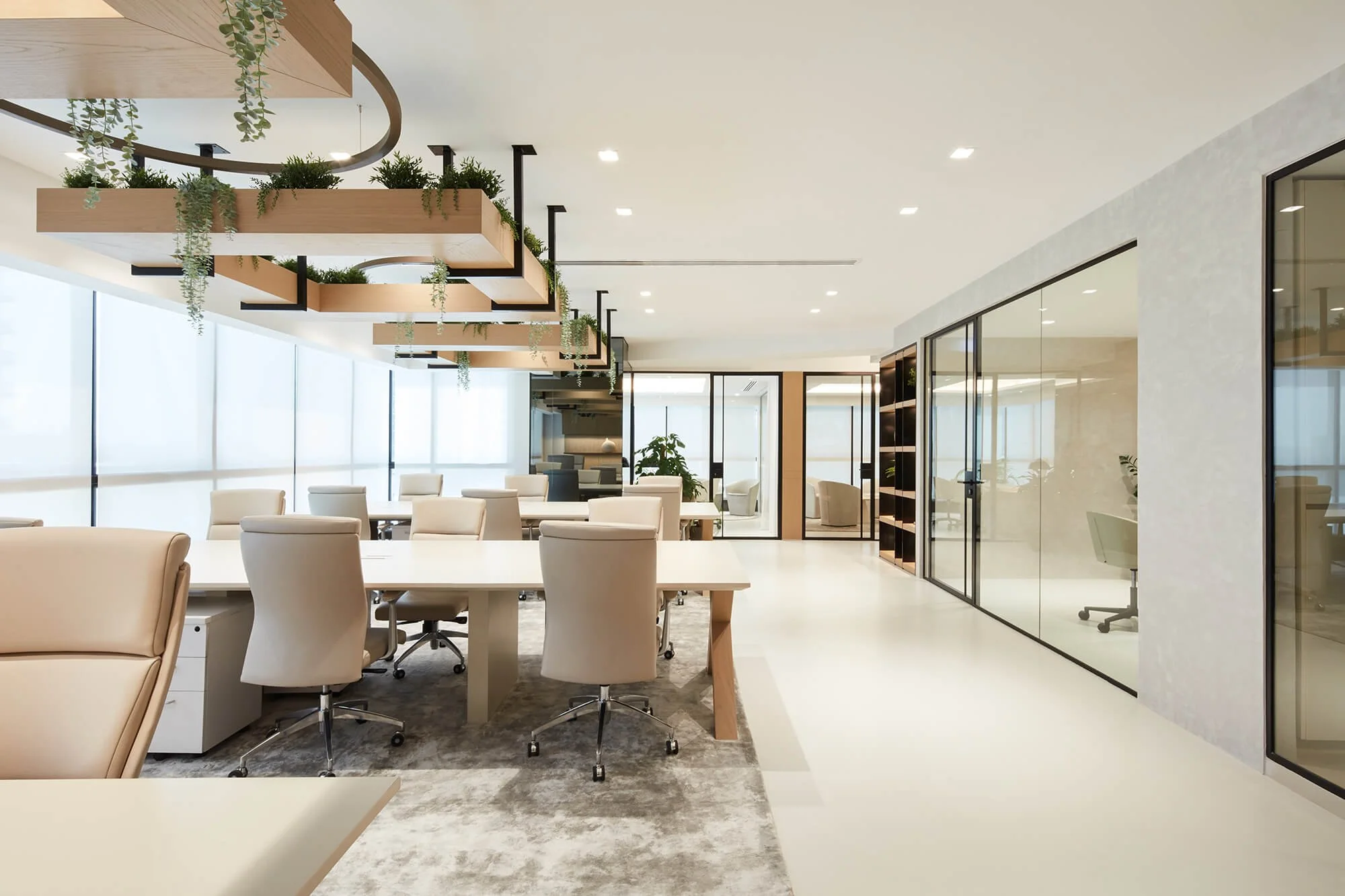 Contemporary office interior designed to create a warm, residential atmosphere with bespoke joinery by MIA Studio.