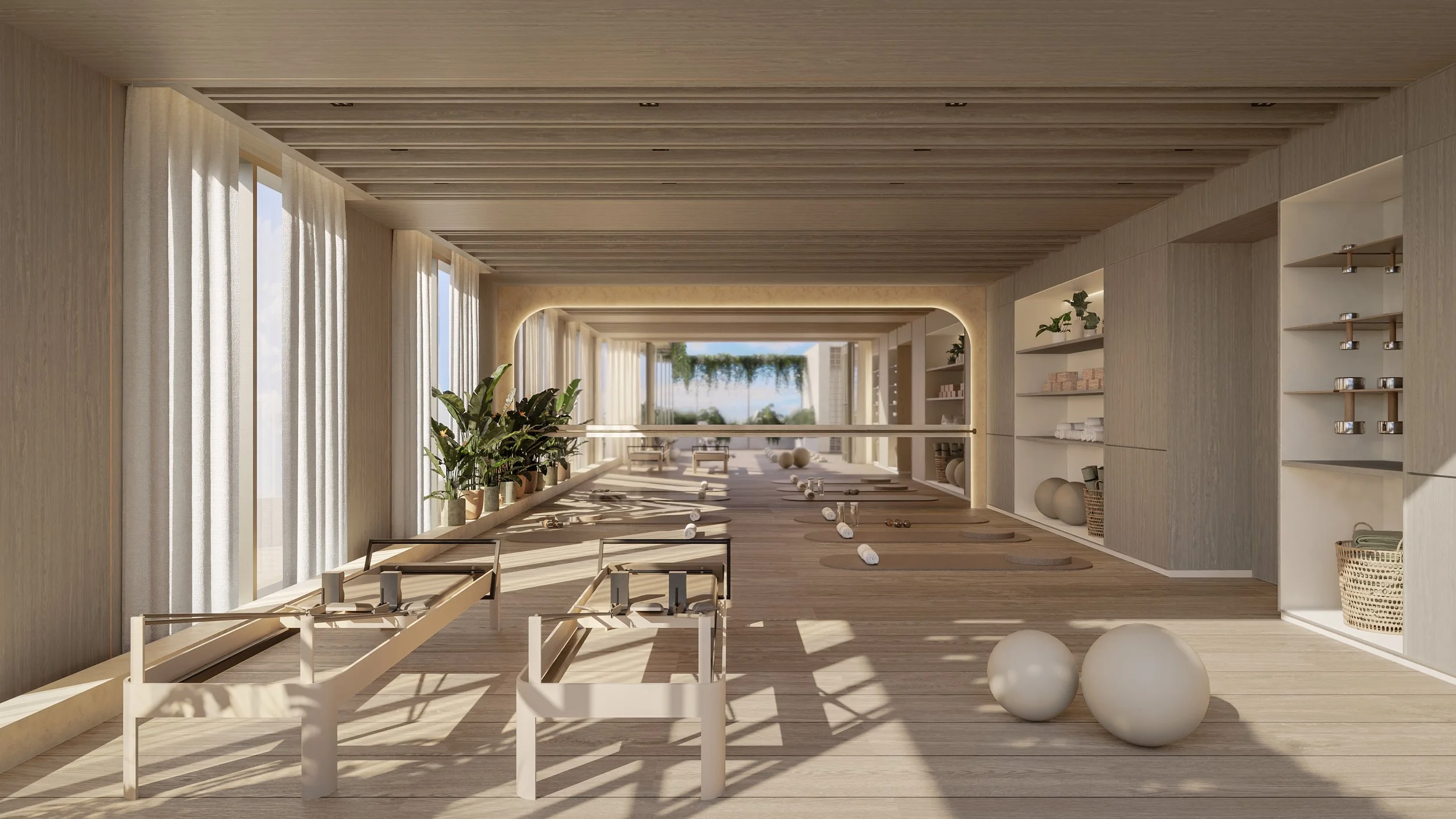 Contemporary wellness studio designed with natural materials, soft neutral tones and abundant daylight by MIA Studio.