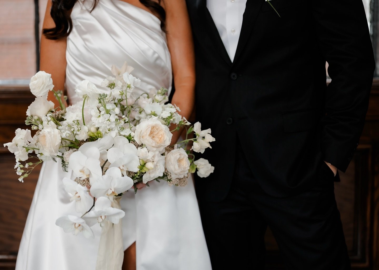 That look🤍 
Can&rsquo;t believe it&rsquo;s been over a year since we flowered this beautiful day for S&amp;J! 

Planner: @brittanyannesevents 
Photographer: @skysthelimitphotography 
Venue: @thehotelmorgan 
Bride: @sarahcapitoni
