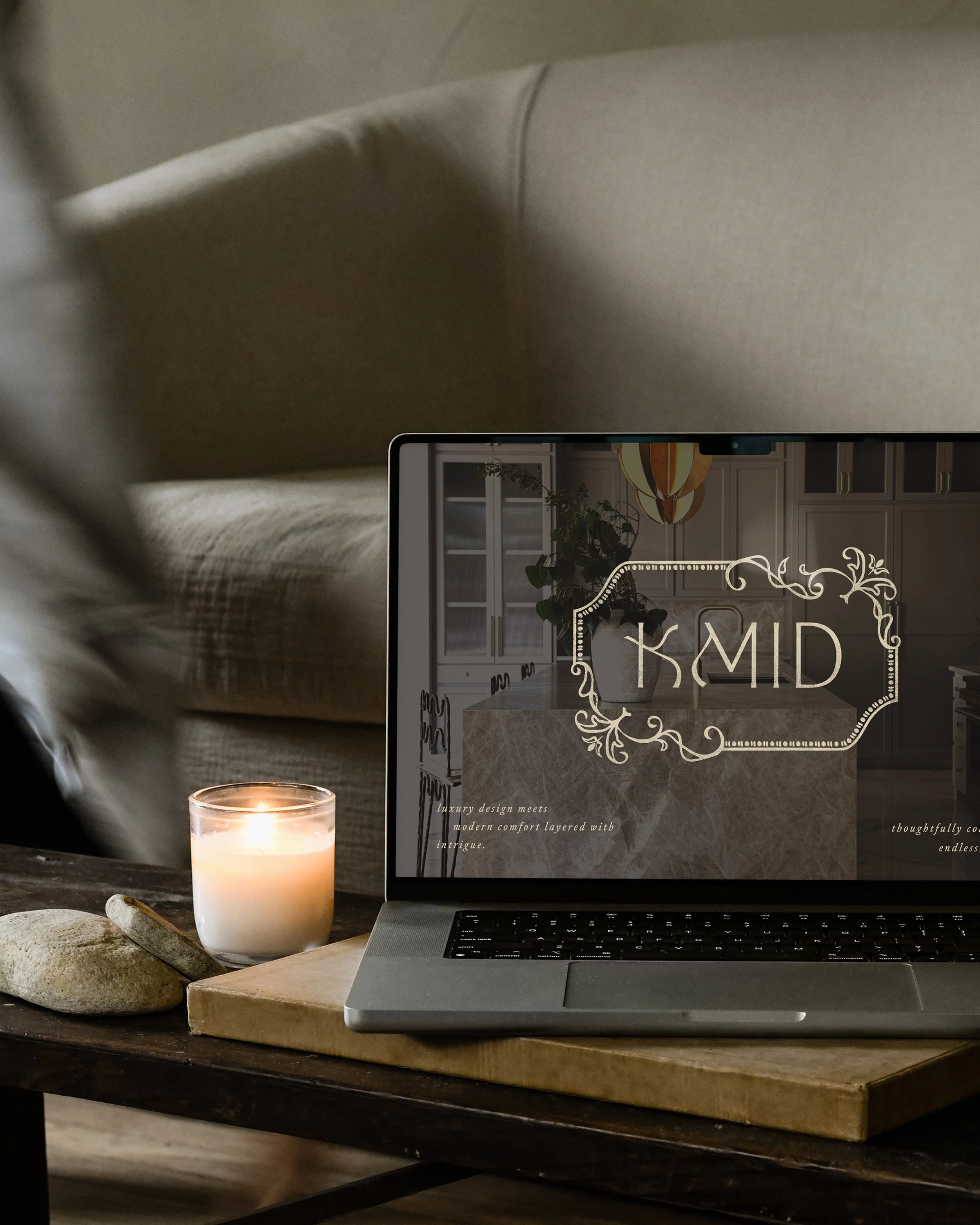 Branding and web design for Kris Middleton Interiors displayed on laptop in styled interior setting, showcasing cohesive brand identity