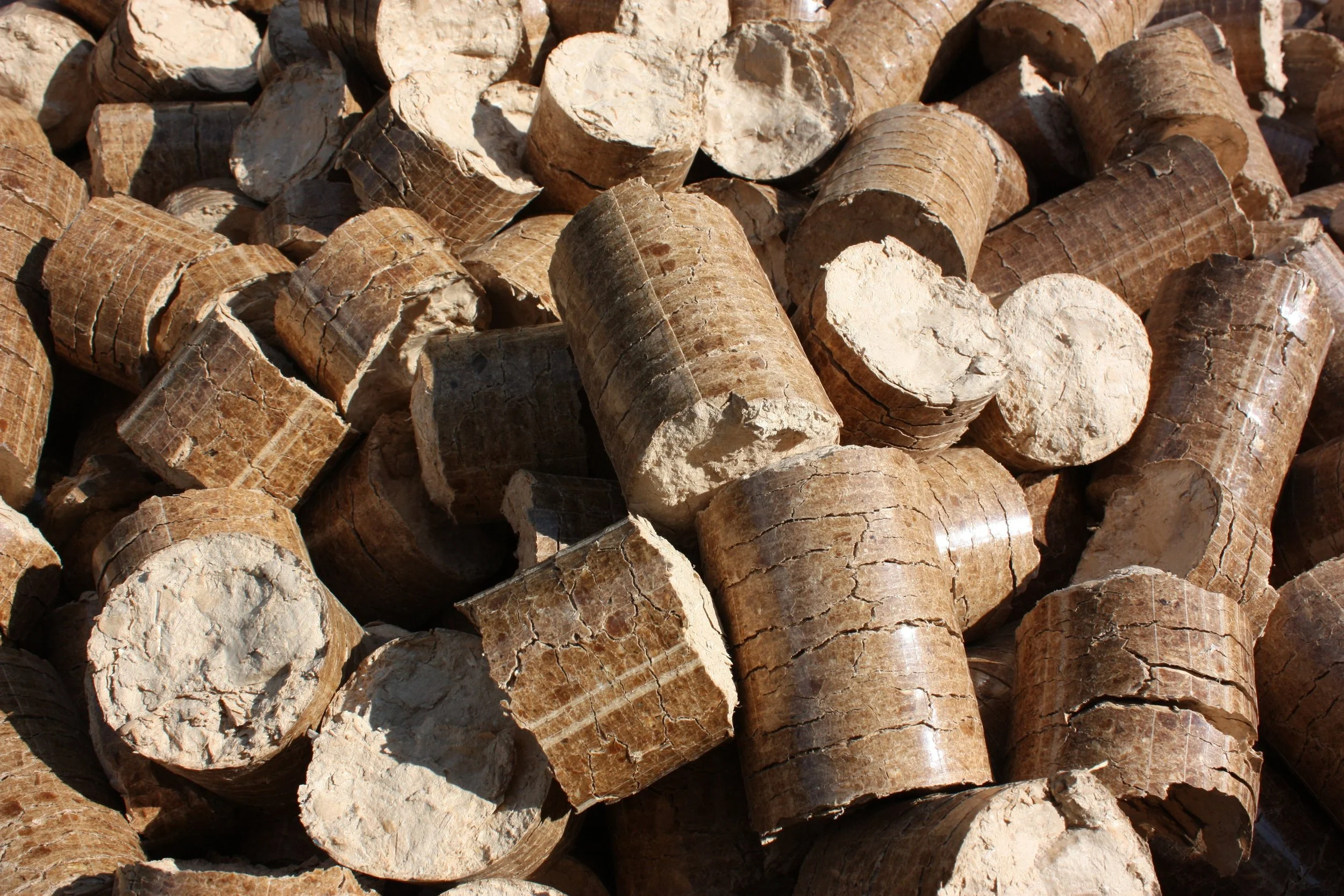 Close-up of wood pellets used as fuel in NORDRE roasting machines