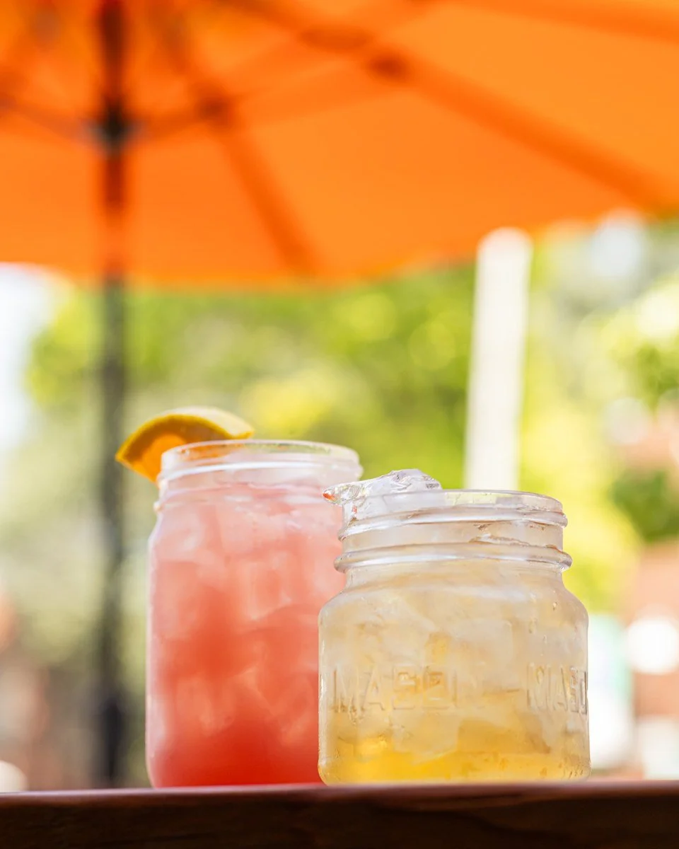 Patrons enjoying lunch and drinks on the patio at Local Cantina Grandview.