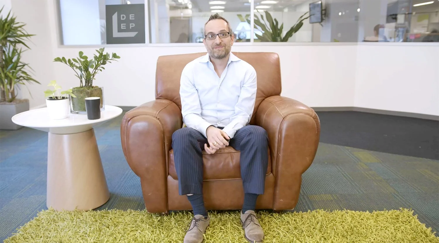SecondMuse CEO Todd Khozein talking to camera
