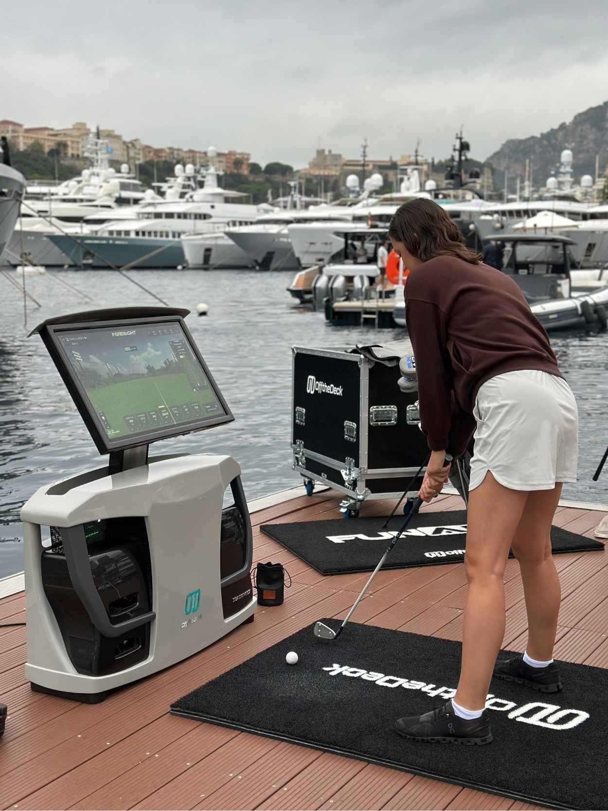 Woman practicing a put on the SeaDriveCX.