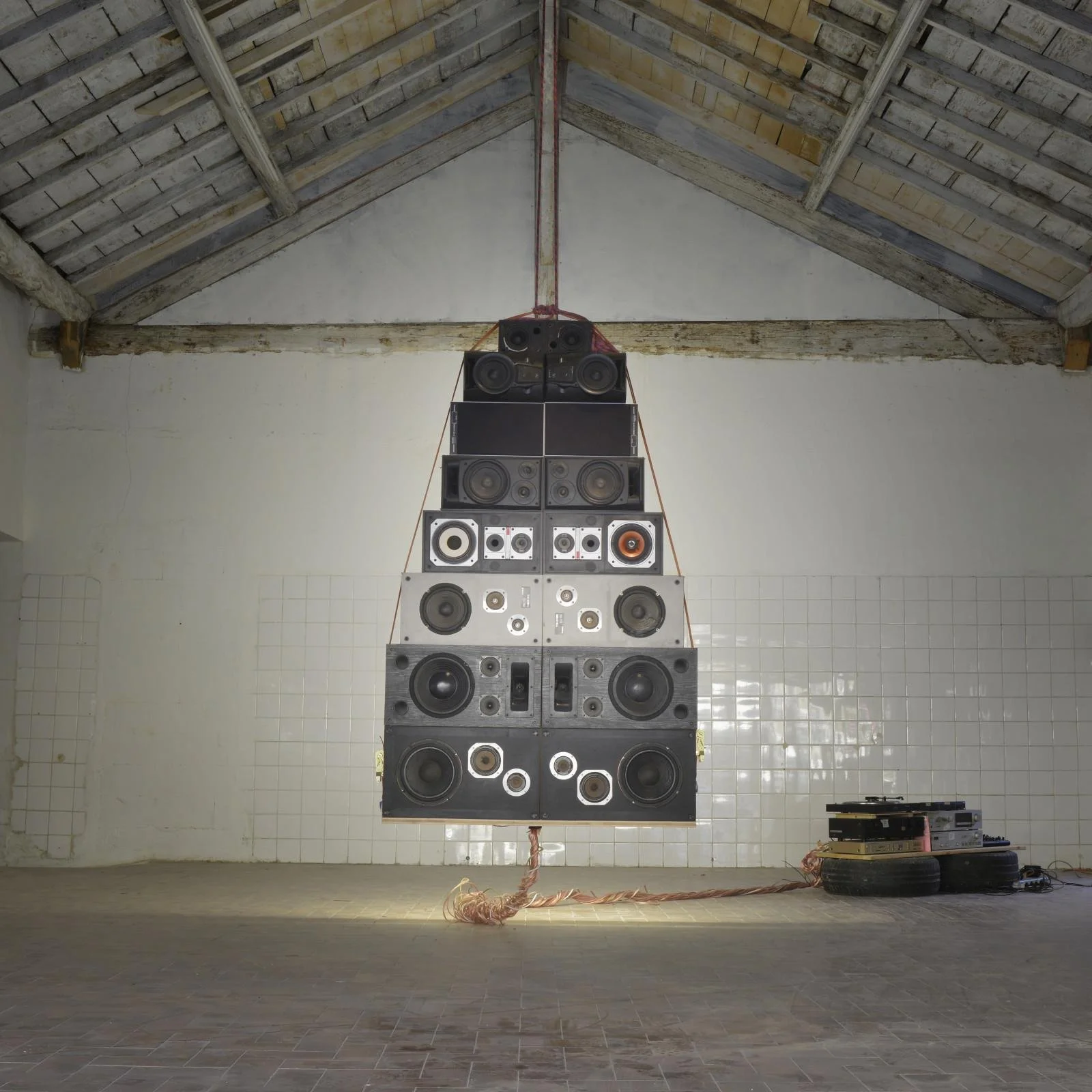 Hanging speaker array from the sun and moon totem installation by artist Reeve Schumacher