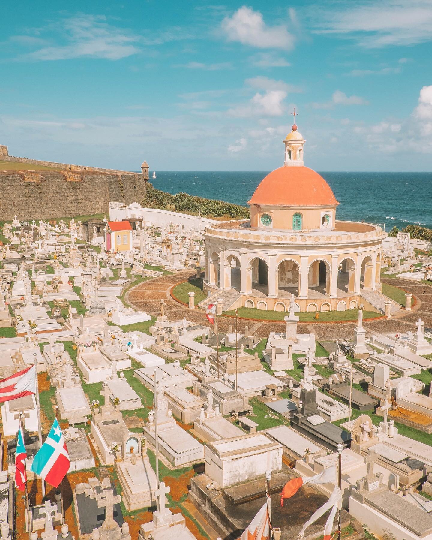 The old cemetery in San Juan is easily the most beautiful one I&rsquo;ve ever seen! Ornate tombstones and flying flags are all over this colonial era cemetery, all while sitting next to the ocean and right outside Fort San Felipe del Morro. &bull;&bu