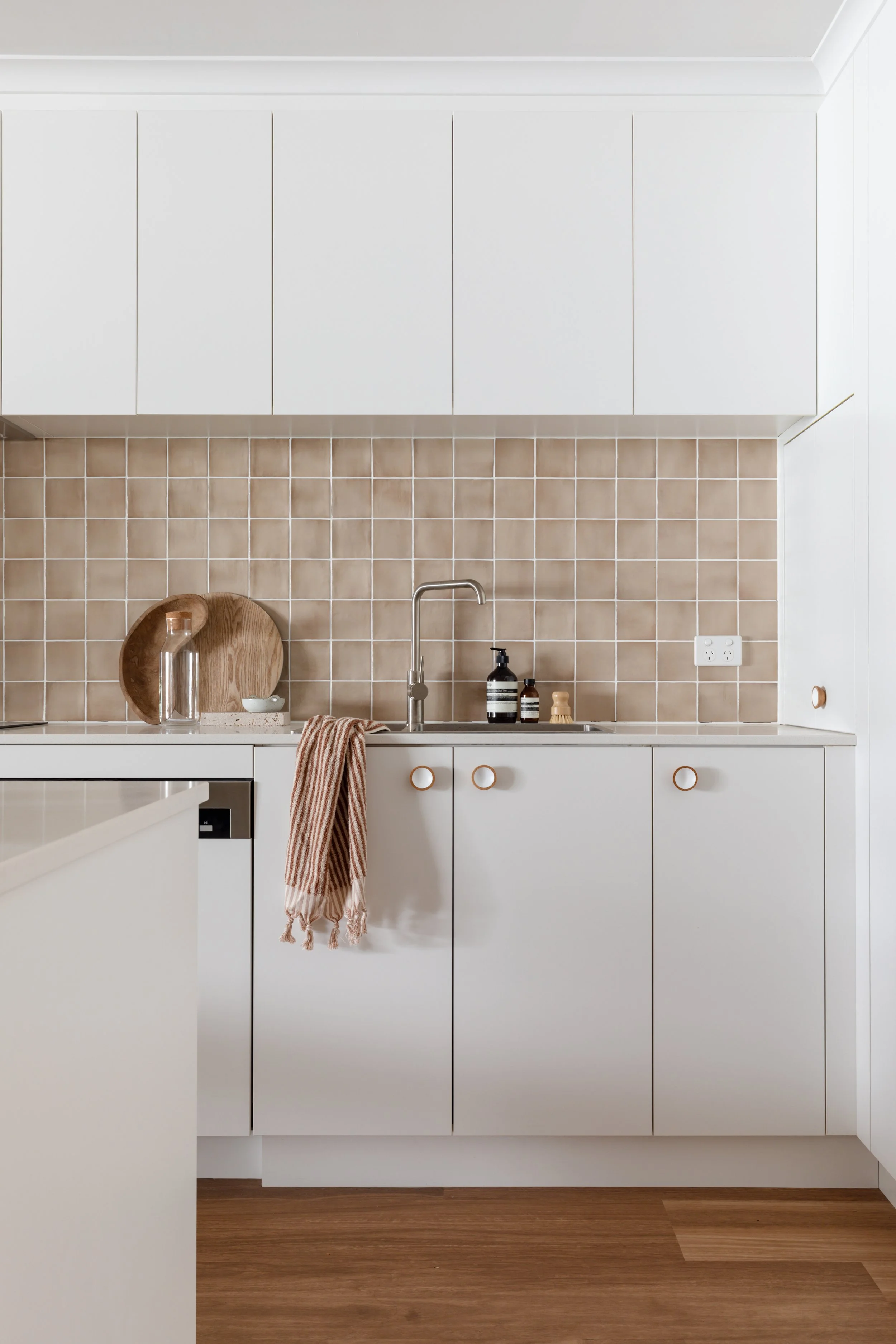 Refurbished kitchen with updated backsplash and cabinetry