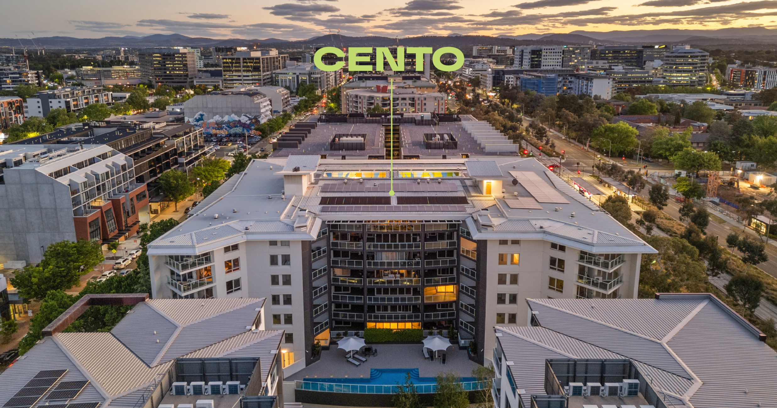 Aerial view of a Braddon and Civic in Canberra at sunset with residential and commercial buildings, streets, and trees with Cento clearly marked.