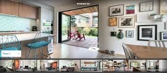 Living room with open sliding glass doors leading to outdoor patio, seating area, and garden.