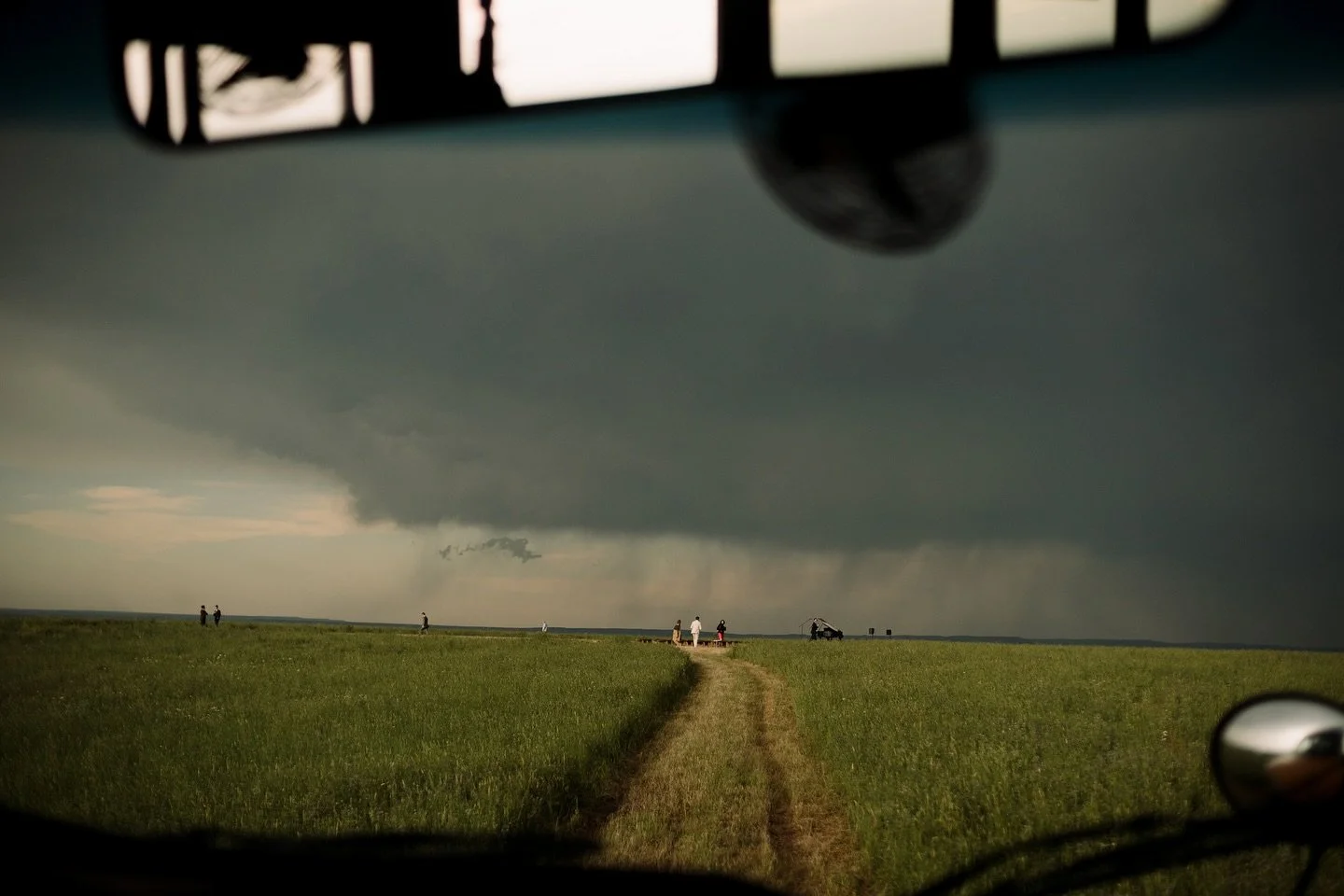 One of my all time favorite ceremony experiences. Up on a bluff in the Montana prairie we all watched the storm go by. Many wouldn&rsquo;t have risked the rain. Sarah and Jim did.