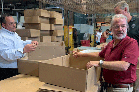 Dave helps prepare new steel enclosures for shipping.