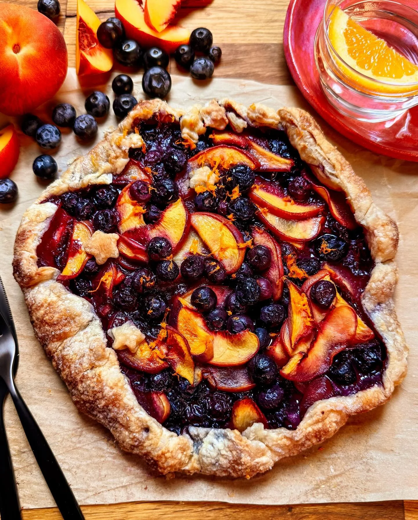 Peach &amp; Blueberry Galette

Happy Sunday, friends! Peaches are pure heaven &amp; blueberries are my berry favorite&mdash;so this is, essentially, a berry heavenly, simple &amp; delicious summertime treat. Galettes are easy to make&mdash;whether yo