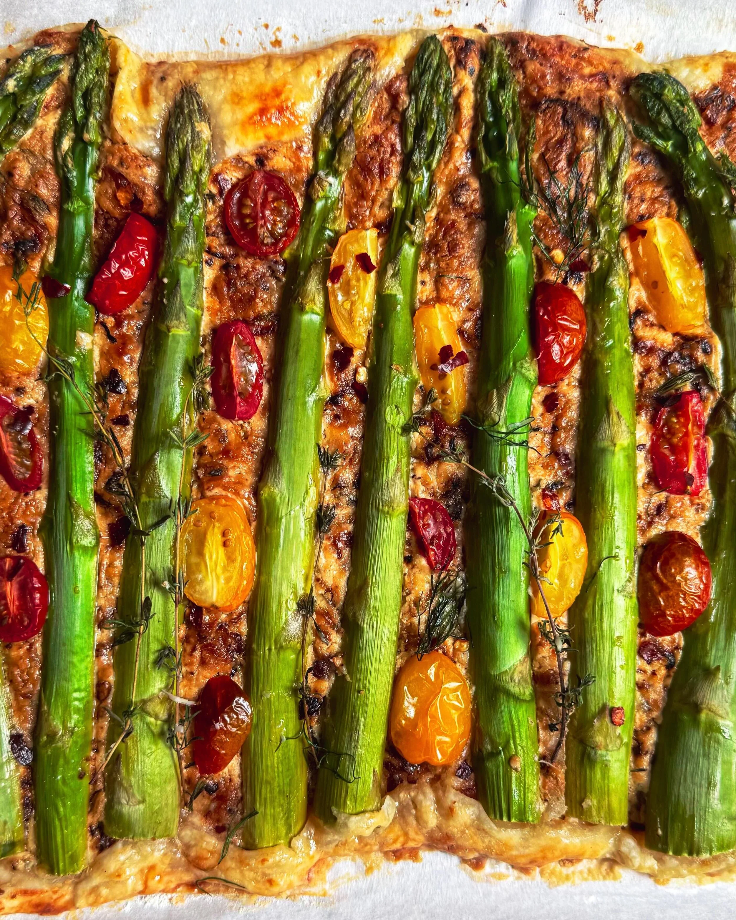 Asparagus &amp; Baby Heirloom Tomato Tart, Goat Cheese with Caramelized Onion 

Hi friends. Tomorrow marks the official first day of summer &amp; in honor of the solstice I wanted to create something simple, elegant &amp; rooted in the beauty of seas