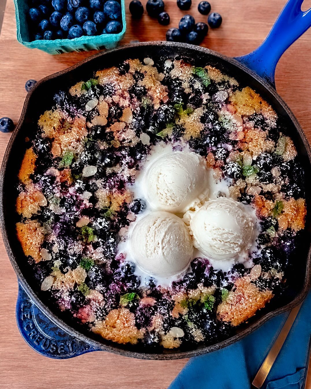 Blueberry Cornbread, Candied Almond Slivers, Mint &amp; Vanilla Bean Ice Cream

Blueberries are my favorite little blue beauties, so naturally I want to put them in everything. Enter Blueberry Cornbread&mdash;with the Megan K. extra kick, of course: 