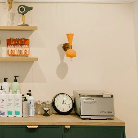 B Parlor Salon's backbar area for stylists to use haircare on their clients.