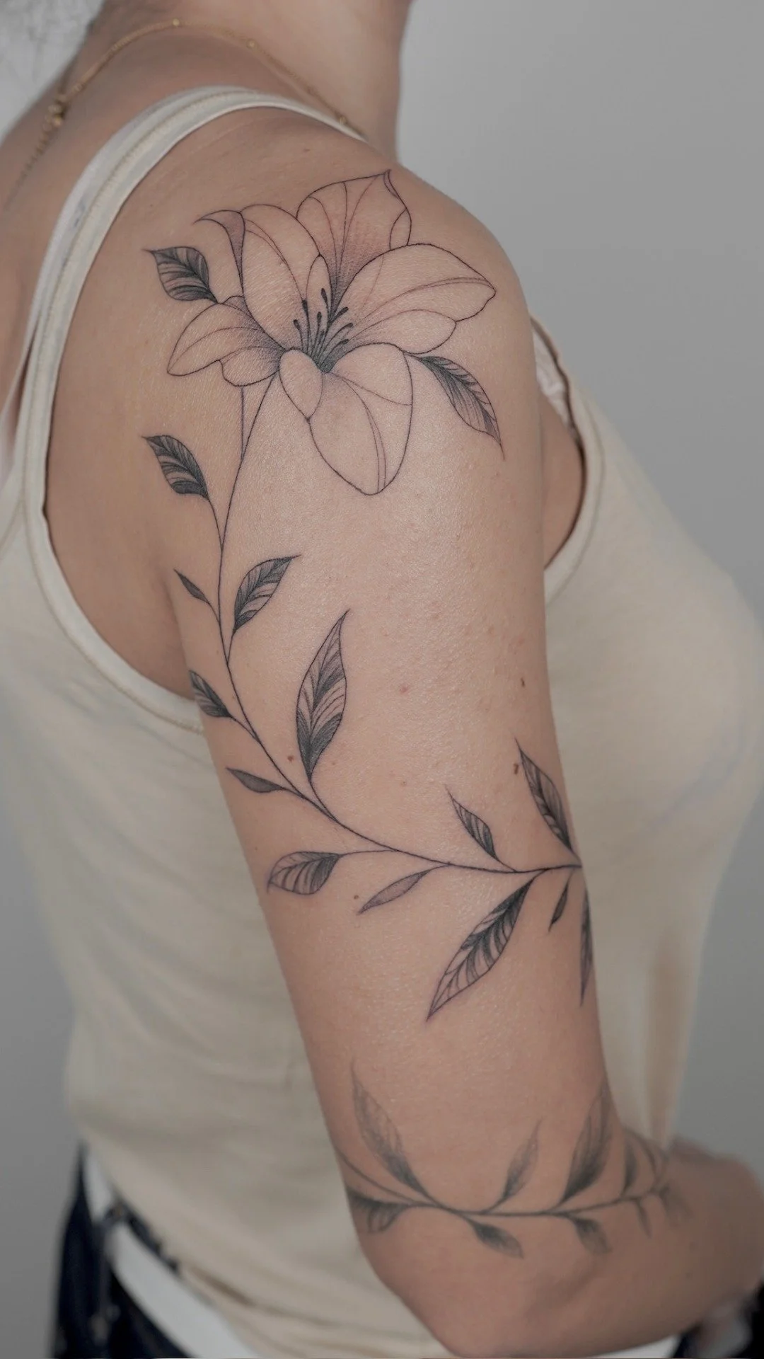 fine-line-floral-shoulder-tattoo-soho-uplift.jpg