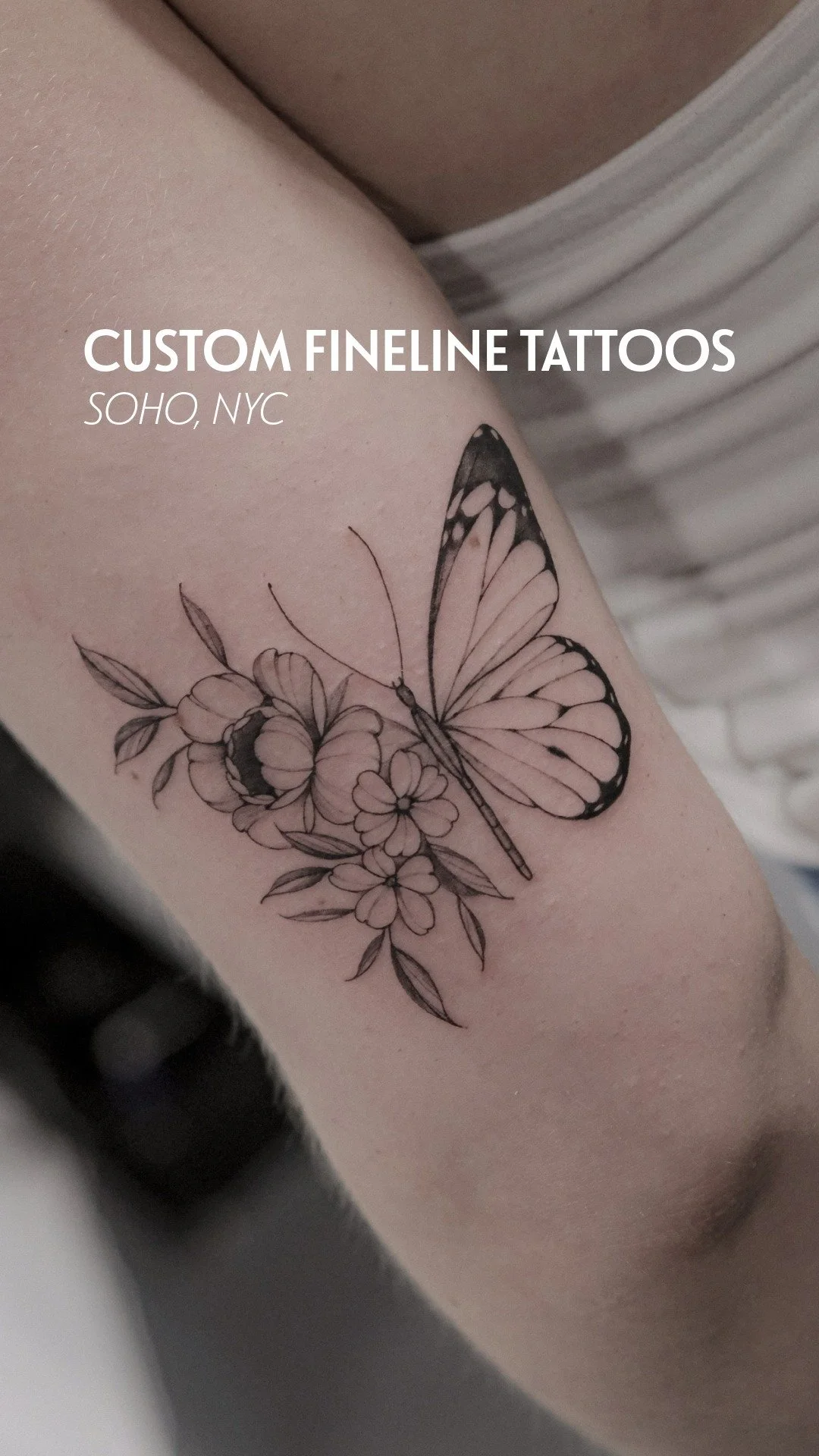 fine-line-tattoo-soho-butterfly-floral-arm-uplift.jpg