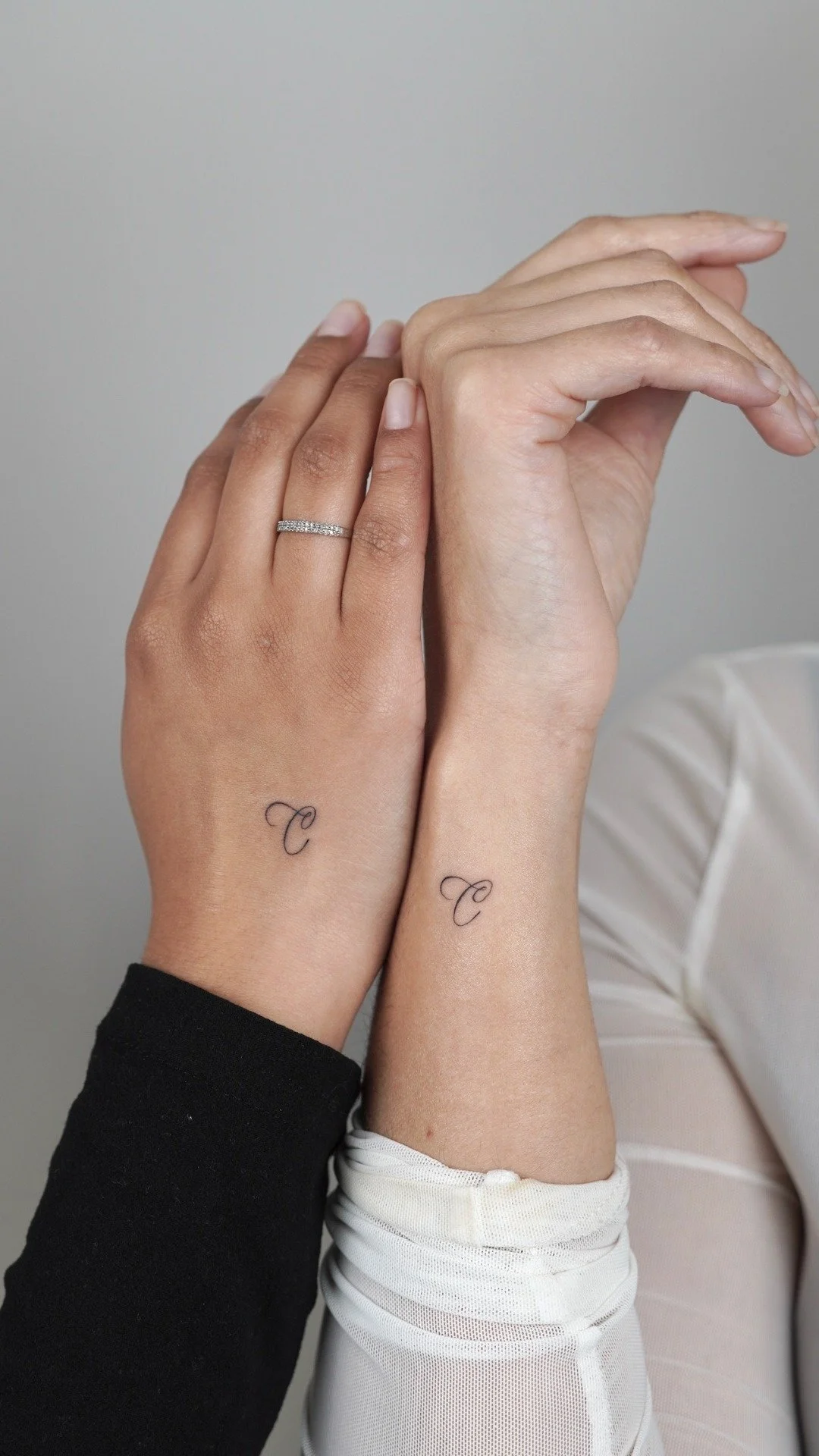 first-tattoo-nyc-matching-initial-wrist-uplift.jpg