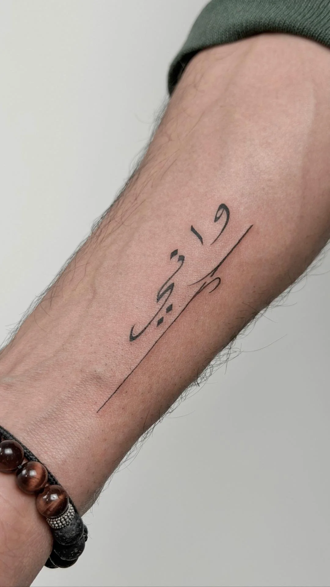 arabic-calligraphy-tattoo-fineline-forearm-nyc.jpeg (Copy) (Copy)
