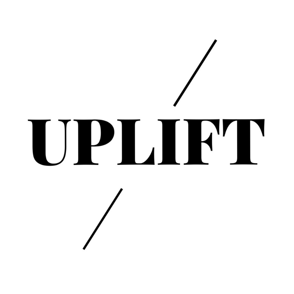 Text graphic with the word 'UPLIFT' Tattoo in SoHo, New York in bold black letters, with a diagonal line above and below the word.