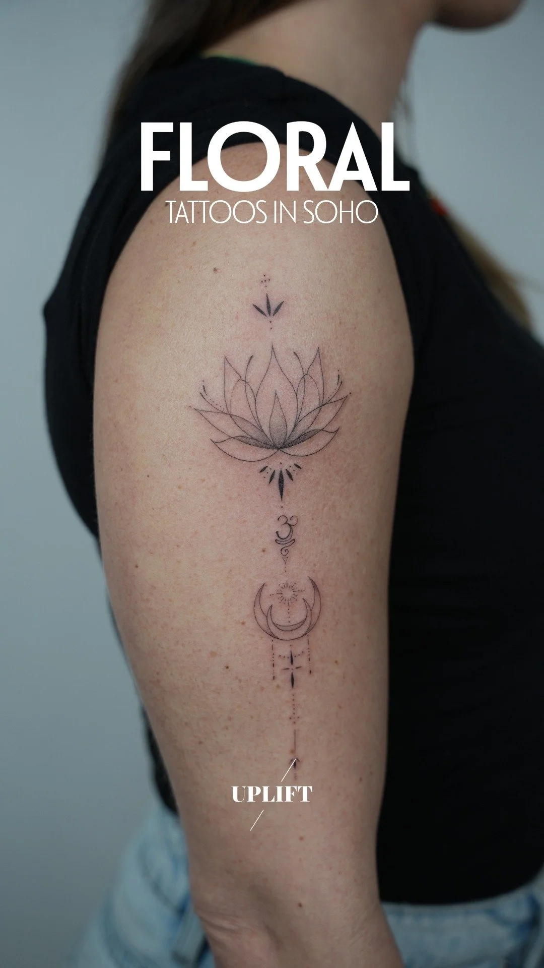 Tattoo of a floral lotus design, moon, and crescent with geometric elements on a woman's upper arm, with the caption 'Floral Tattoos in Soho'.