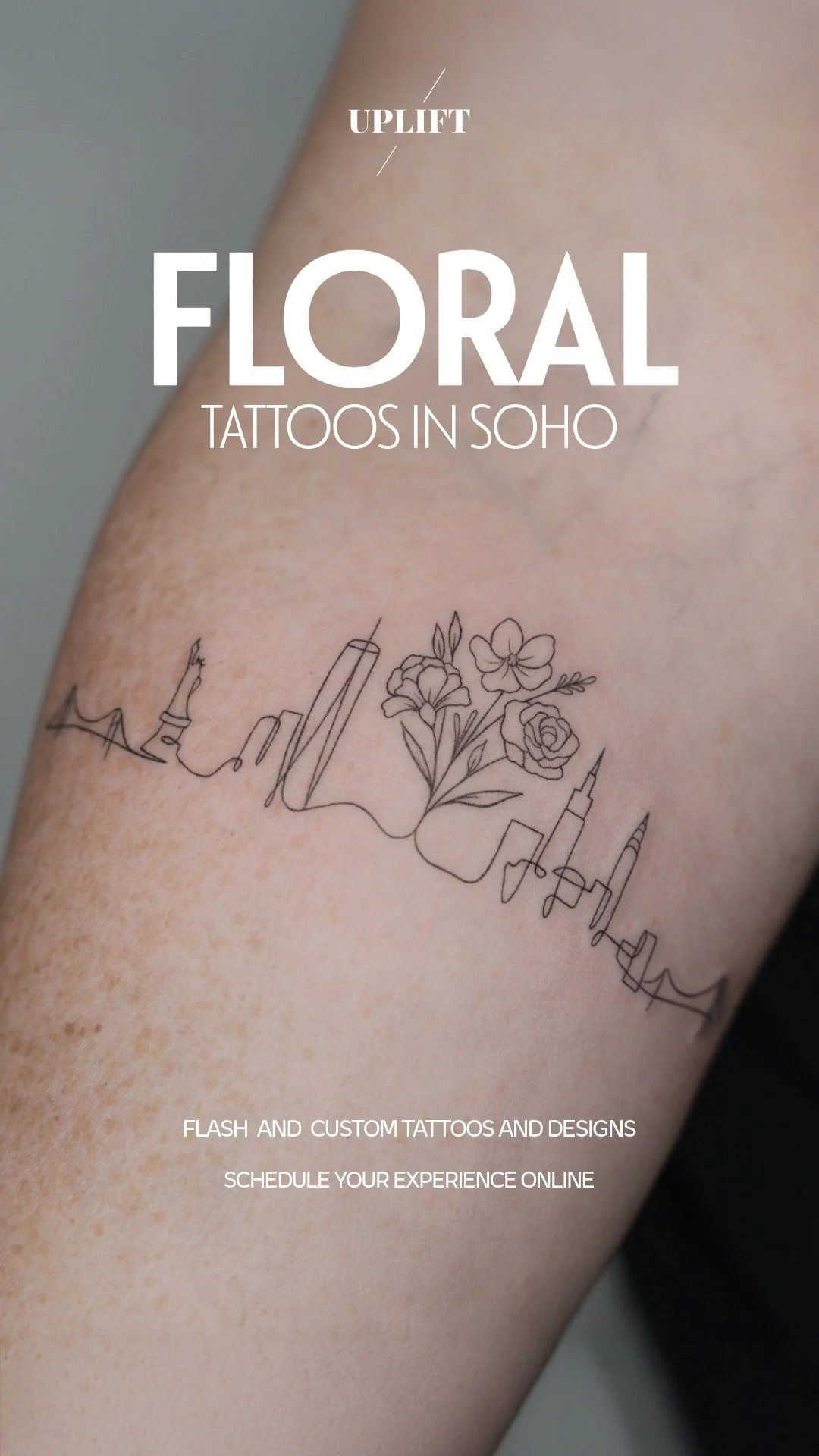 A tattoo of a city skyline with a bouquet of flowers in between, on a person's arm, with promotional text for floral tattoos in Soho.